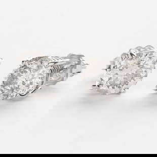 3 carat 14K gold and Natural Diamond Stud Earrings: 3 carat 14K gold and Natural Diamond Stud Earrings3 carat 14K gold and Natural Diamond Stud Earrings using a clutch back for closure. They are marked with the hallmarks "14K 8 3.02 cttw" and