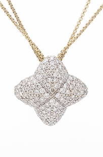 Vintage David Yurman 18K White Gold and Diamond Pendant Necklace The chain is 16" long and the: Vintage David Yurman 18K White Gold and Diamond Pendant NecklaceThis is a vintage designer David Yurman 18K yellow gold necklace featuring a white gold quatrefoil pendant studded with pave set full cu