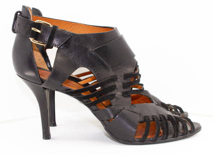 Givenchy Leather Booties with Cut-Out Details: Givenchy Leather Booties with Cut-Out Detailssize 38 SHIPPING: Collective Hudson does NOT offer in-house shipping or quotes. Please refer to shipping policy or terms for a list of third party shippers