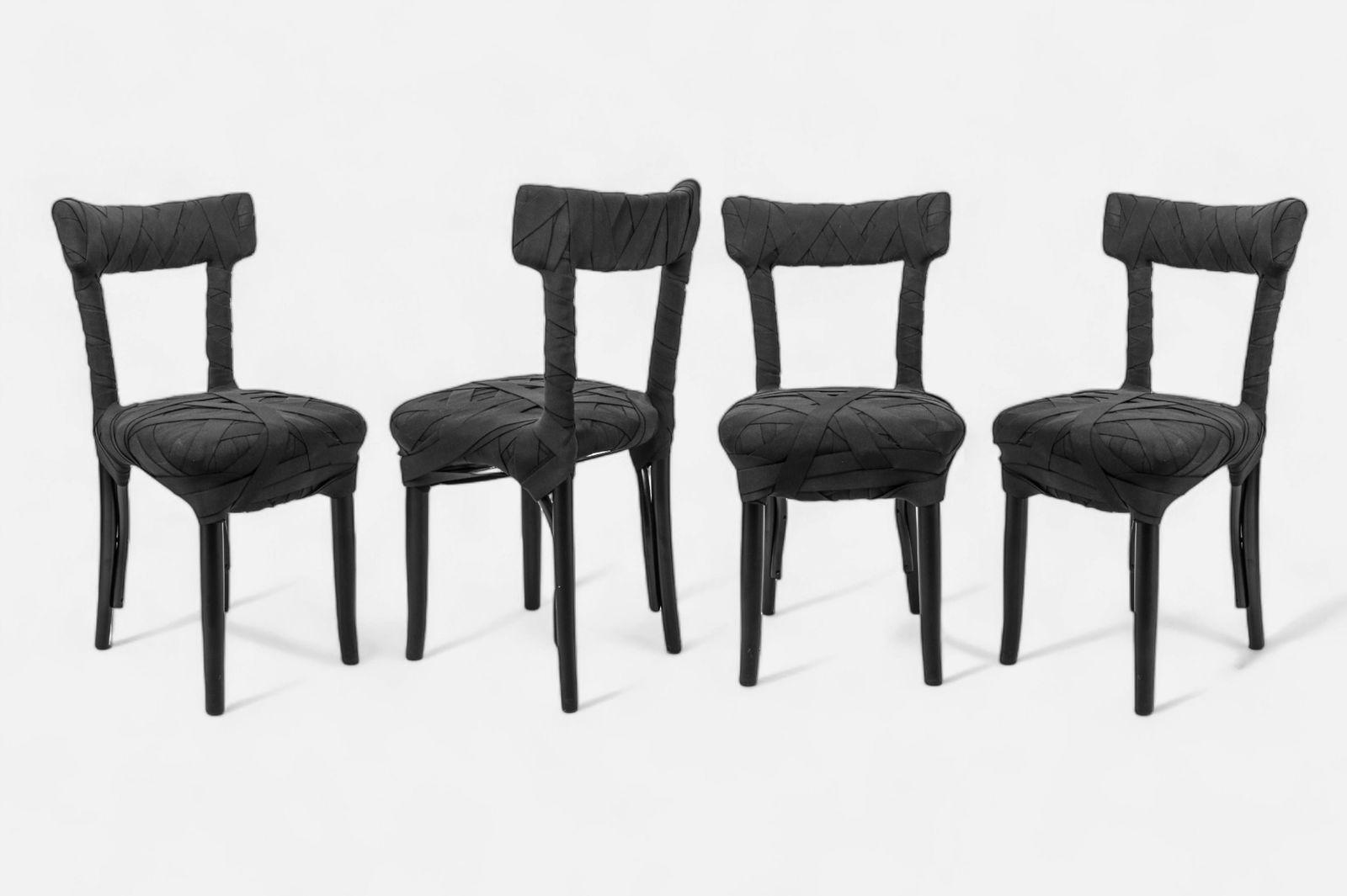 FOUR (4) Peter Traag For Edra Black "Mummy Chairs": 4 (Four) Peter Traag For Edra Black "Mummy Chairs" The "Mummy Chair" by Peter Traag for Edra..... chair frame of bent beechwood is wrapped in strips of fabric, similar to bandages for the preservation