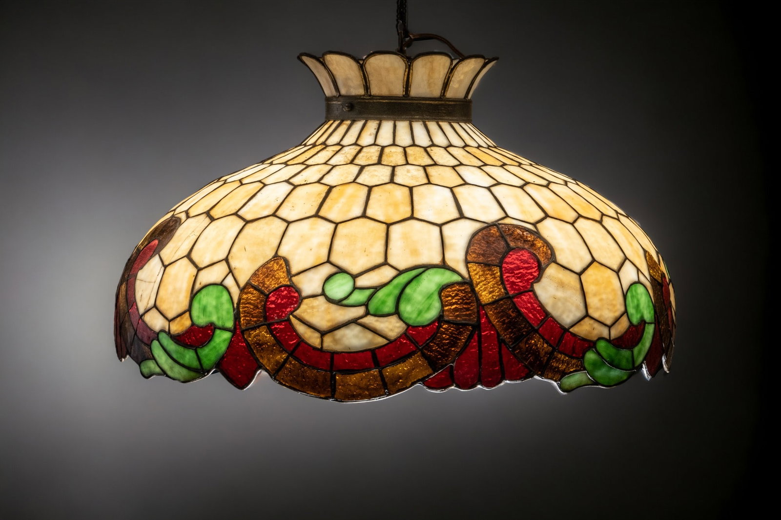 Tiffany Style Leaded Glass Chandelier, Early 1900's: Keywords: Stained Glass, American Arts and Crafts, Pendant Light, Art Glass Movement, Handcrafted, Tiffany-type leaded glass lamp, Lighting Summary: This Tiffany-style stained glass chandelier, crafte