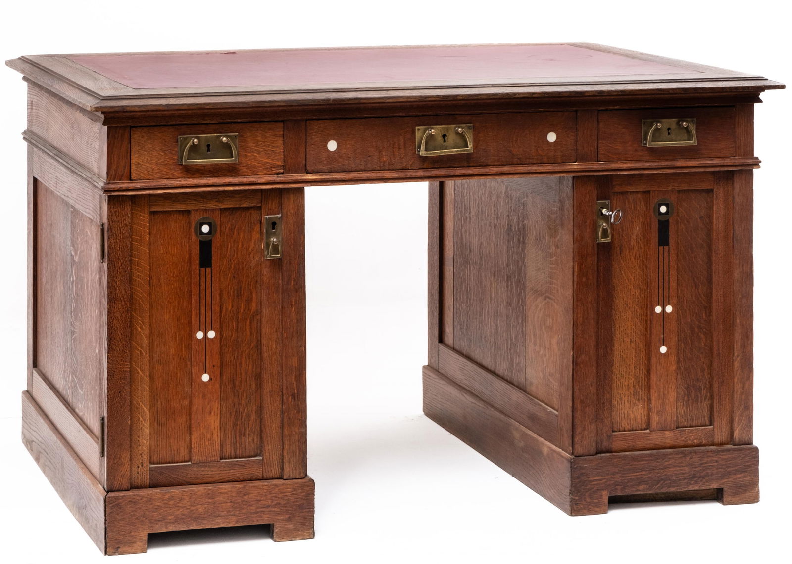 Vienna Secessionist Inlaid Oak Pedestal Desk attrib. Peter Behrens: Keywords: Jugendstil, Oak Inlaid, Koloman Moser, Writing Desk, Adolf Loos, False Doors, Shelves, Writing Pad, Fine Furniture, Art Nouveau Summary: A Secessionist period oak pedestal desk, the apron fi