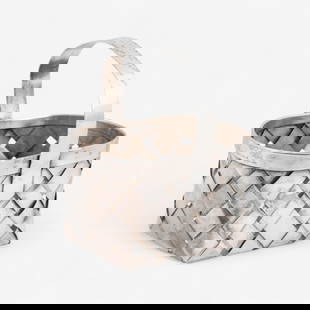 Signed Cartier Hand-Woven Sterling Silver Basket, “Hand Made Sterling: Keywords: Luxury gifts and accessories, designer signed, sterling silver, woven basketCartier sterling silver basket featuring a woven design with fixed handle. Stamped “Cartier&rdquo; and annotated