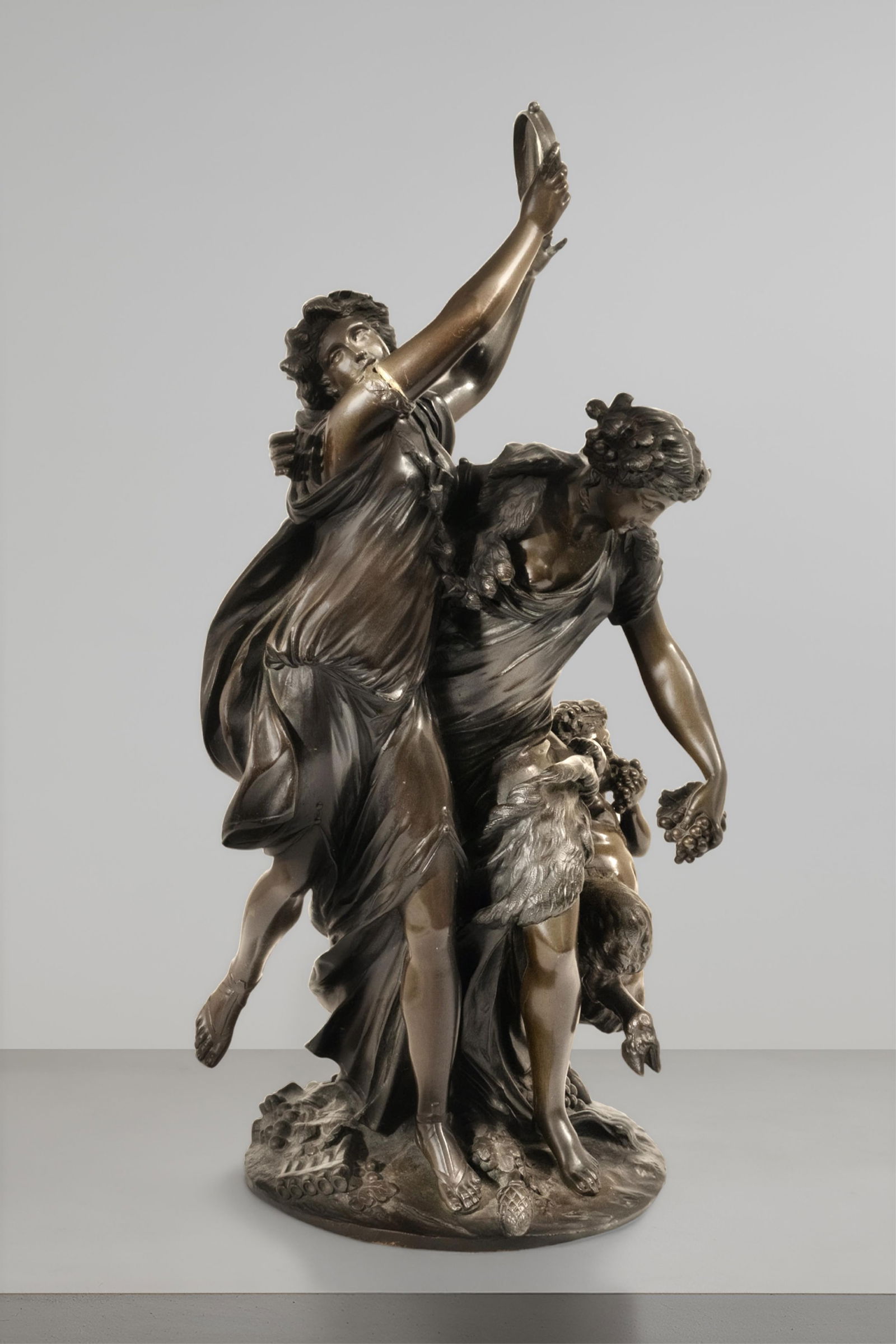Signed Clodion "Bacchanalia" Bronze Sculpture Raingo Freres Foundry Marking, circa 1860: Keywords: Clodion, Raingo Freres, Patinated Bronze, 19th Century Art, "Bacchanalia" Classical Sculpture, Mythological Scene, French Foundry, Decorative Art, Historical ArtworkSigned Clodion "Bacchanal