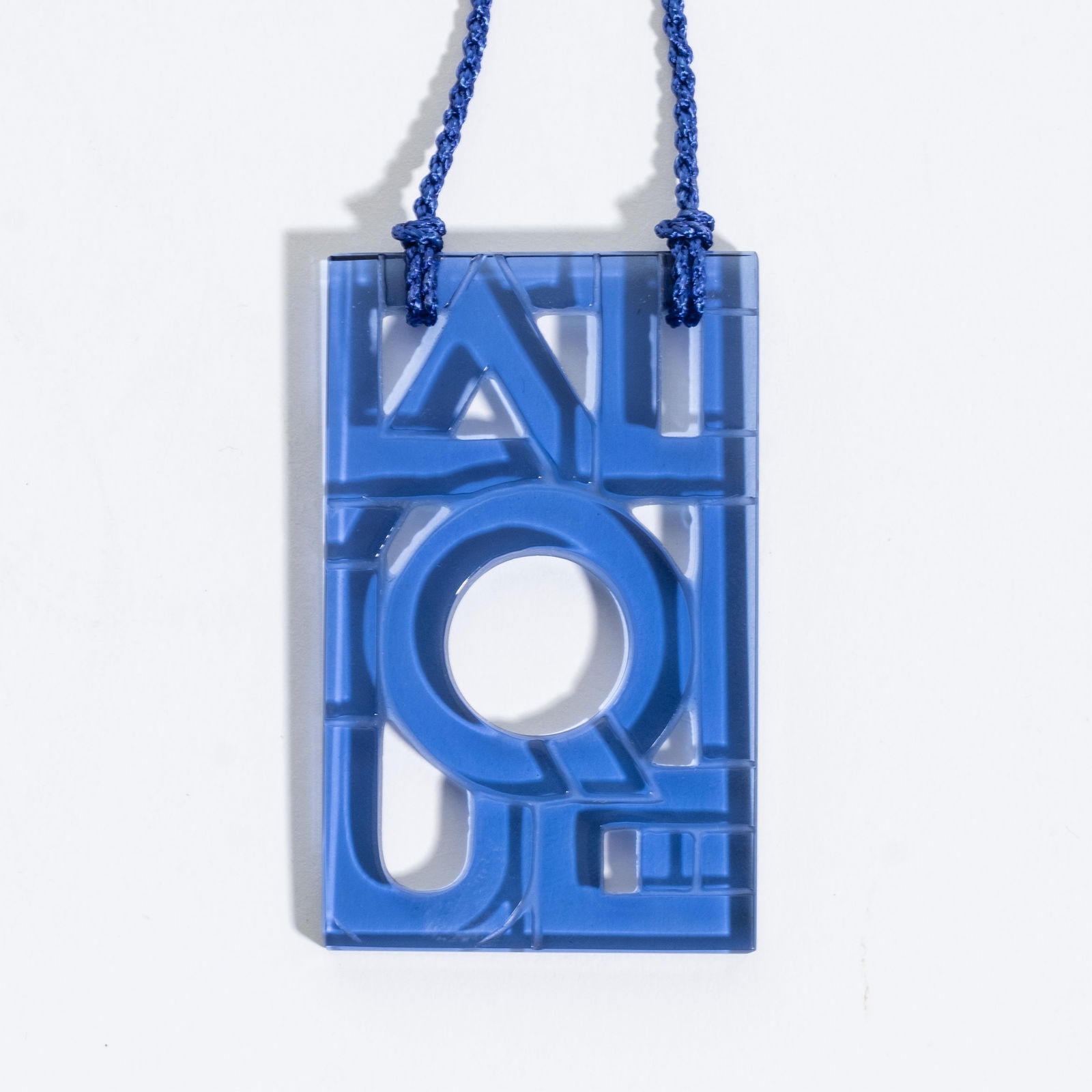 Signed Lalique Pendant Logo Necklace in Blue Etched Molded Art Glass: Keywords: Contemporary Art, Modernist Jewelry, Bauhaus Influence, Minimalist Design, 21st Century Modern, Pop Art, Frank Gehry Style, Issey Miyake Style, Marc Newson Style, Laser Cutting, Statement Je
