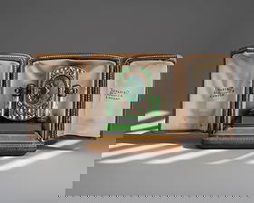 Tiffany & Co Gold Silver and Enamel Clock set with Jewels, Early 20th Century, Engraved Leather Case: Keywords: Art Deco, Ruby Cabochon Jewelry, Belle Epoque, Edwardian Era, Early 20th Century Clock, French Modernism, Fin-de-Siecle, Cartier style, Faberge style, Luxury Designer, Boucheron style, Louis