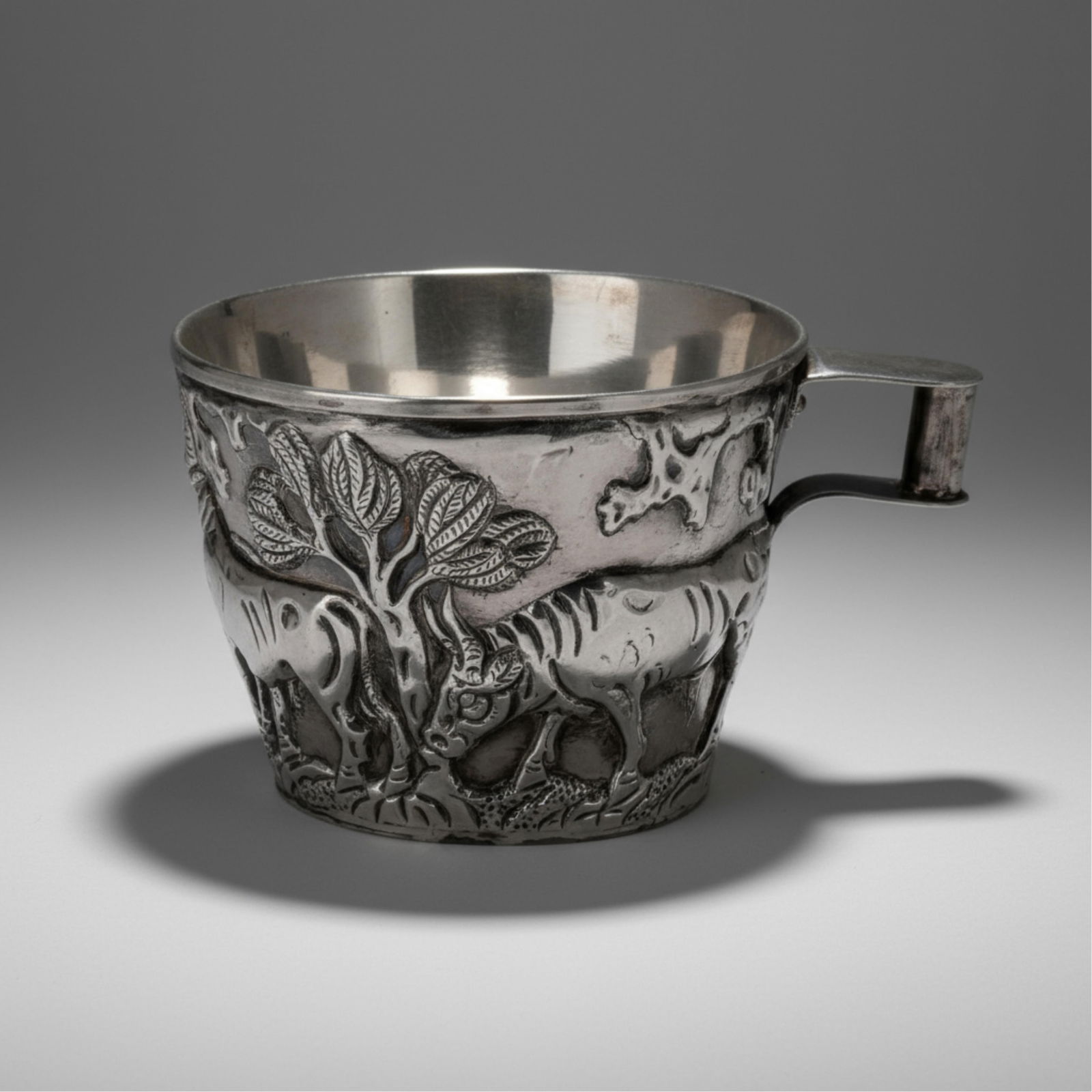 Zolotas, signed Silver Vaphio Goblet with Chiseled Mediterranean Scenes: Keywords: Neoclassical Revival Cup, Historicist Style,, sterling silver, 20th century, Agriculture, zoological motif, figural relief, Ancient FarmingZolotas signed silver goblet, the exterior chiseled