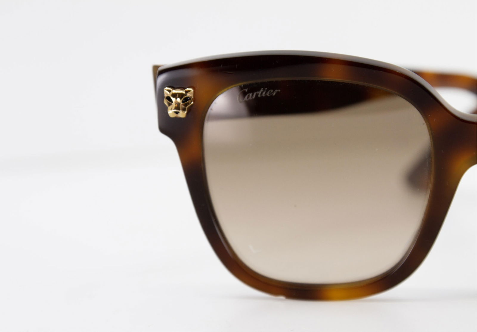 Cartier, Panthere De Cartier Sunglasses, Lens dimensions 51 mm, of the bridge 23 mm, of the rods 145: Keywords: Luxury Eyewear, French Fashion House, Contemporary Accessory Design, Early 21st Century, Handcrafted Frames, Tortoiseshell Finish, Gradient Lenses, Precision Optics, Gold Tone Hardware, Sign