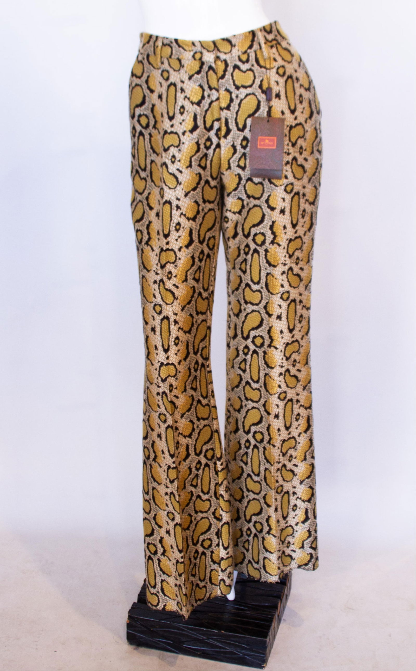 ETRO, Python Pattern Bell Bottom Style Pant: Keywords: Late 20th Century Fashion, Italian Designer Style, European Luxury Wear, Bohemian Glam Aesthetic, Statement Print Design, High-Waisted Cut, Flared Leg Silhouette, Wide-Leg Pants, Retro Disco