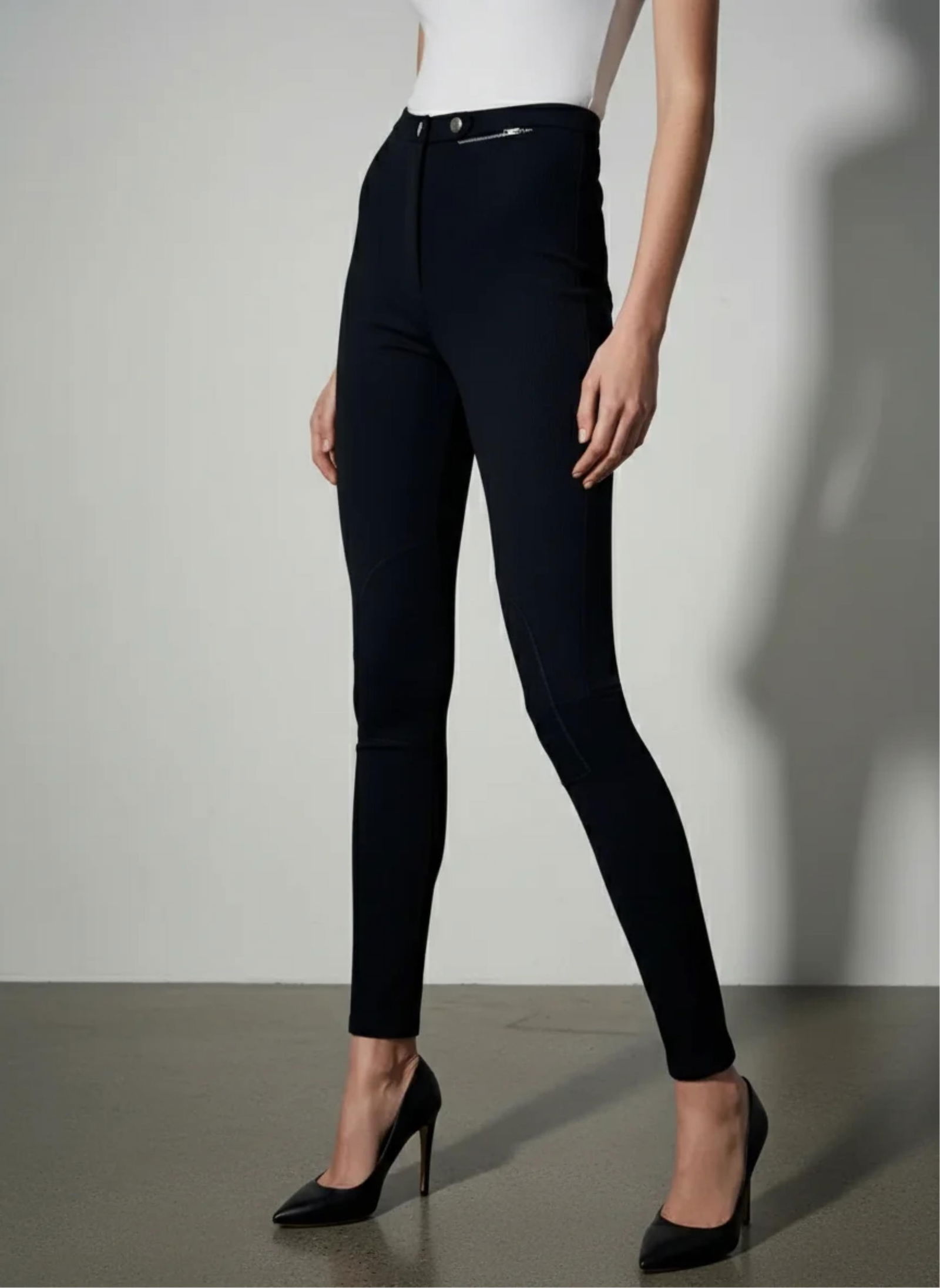Dolce Gabbana, Equestrian Riding Tights with Reinforced Knee for Jumpers: Keywords: Italian fashion house, late 20th century, form-fitting silhouette, equestrian sport style, luxury activewear design, couture sportswear, modern performance tailoring, Rare Fashion Auction,