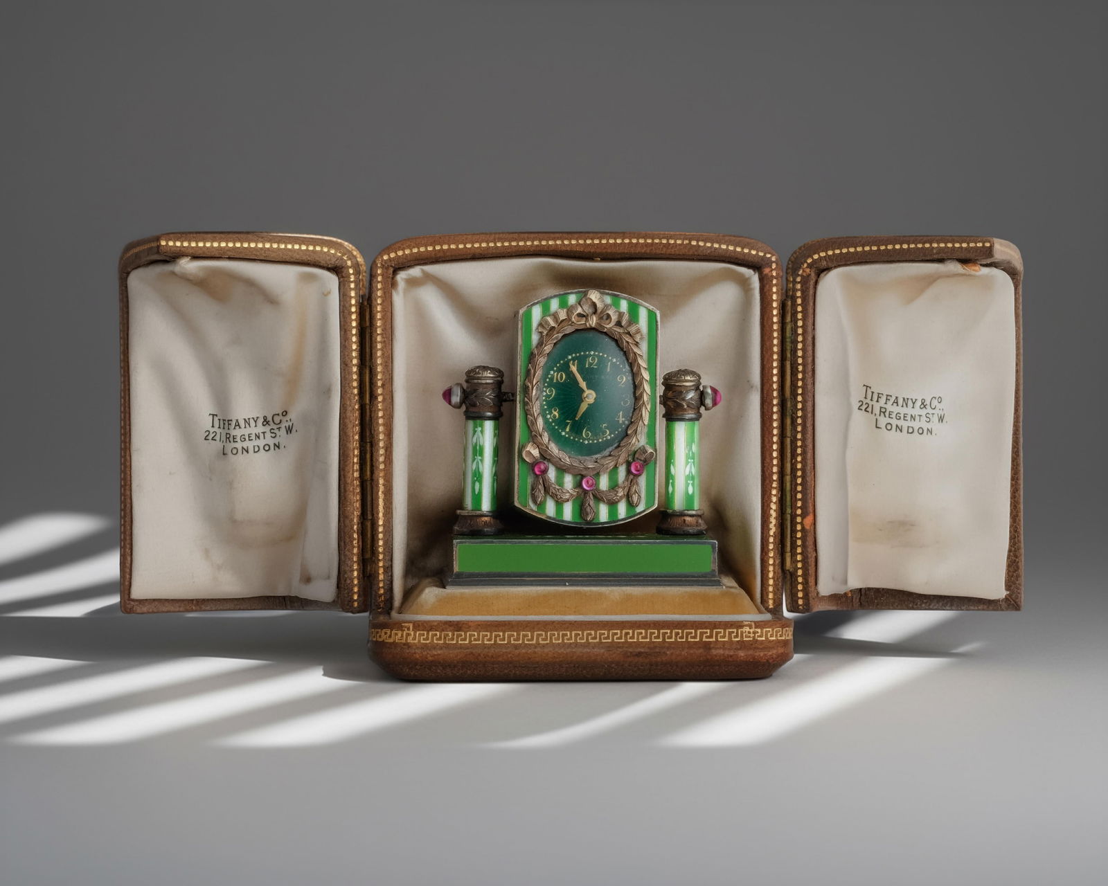 Tiffany & Co Gold Silver and Enamel Clock set with Jewels, Early 20th Century, Engraved Leather Case: Keywords: No reserve, Art Deco, Ruby Cabochon Jewelry, Belle Époque, Edwardian Era, Early 20th Century Clock, French Modernism, Fin-de-Siècle, Cartier style, Fabergé style, Luxury Designer,