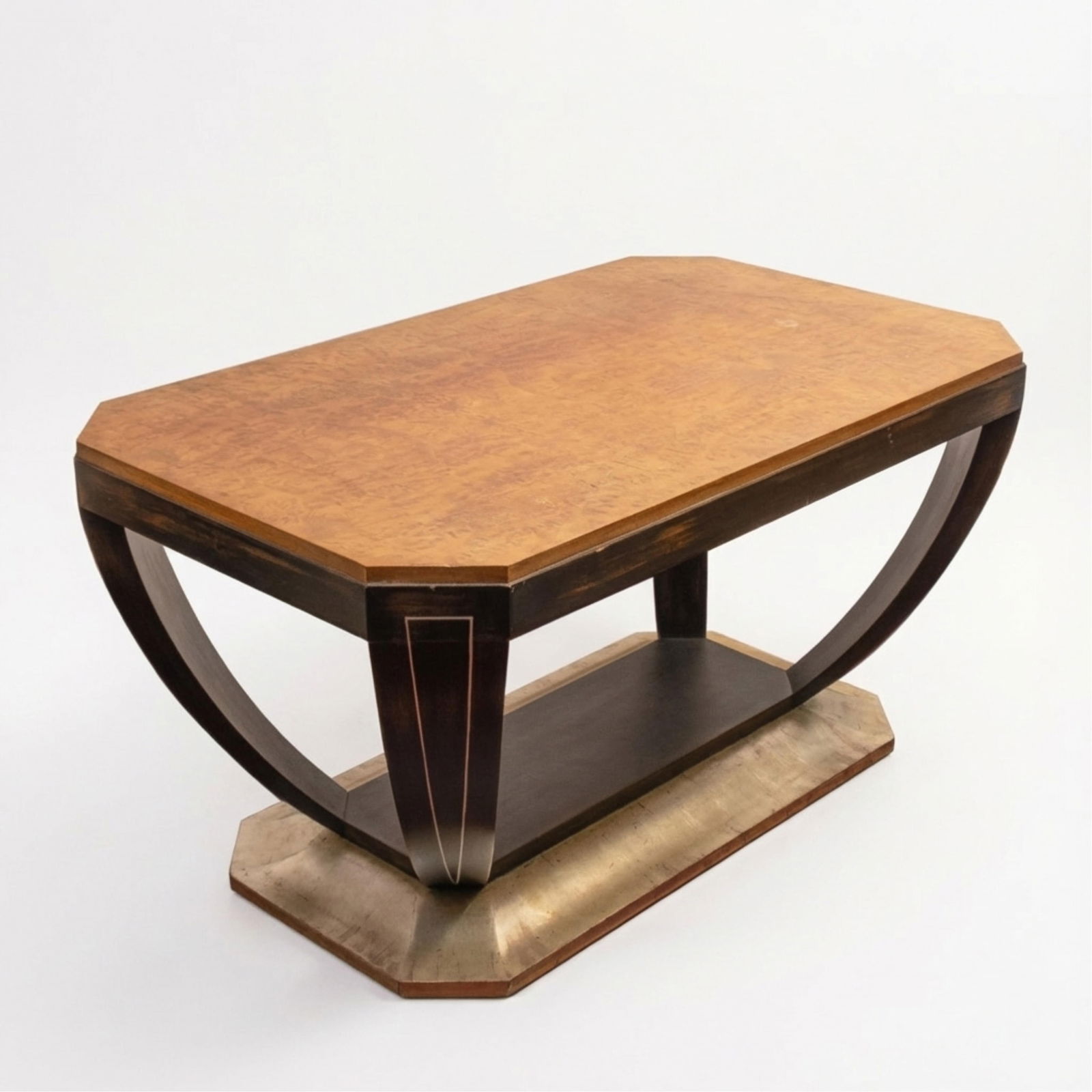 Art Deco Burled Elm And Silver Leaf Center Table, Circa 1930: Keywords: No reserve, coffee table, low table, modernist furniture, 1930s furniture, European design, sculptural base, decorative furniture Summary: Art Deco burled elm center table featuring a