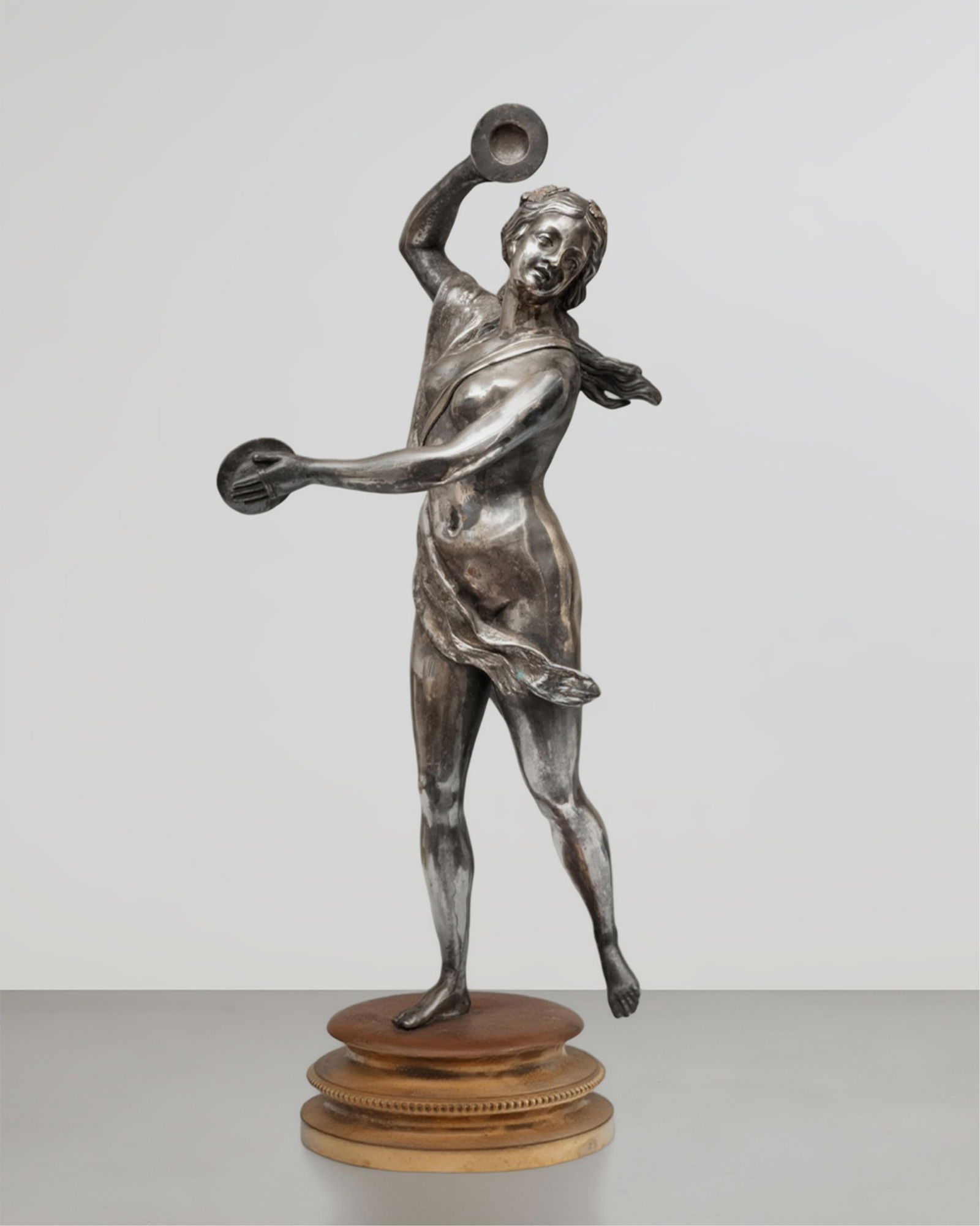 Michel Claude Clodion, Antique French Bronze Sculpture Titled, "Bacchante Playing Cymbals", 1880: Keywords: No reserve, Silver-Plated Bronze, Gilt Bronze, Clodion Style, Bacchante Playing Cymbals, Pearl Frieze, French Sculpture, Classical Influence Summary: "Bacchante Playing Cymbals" is an 1880