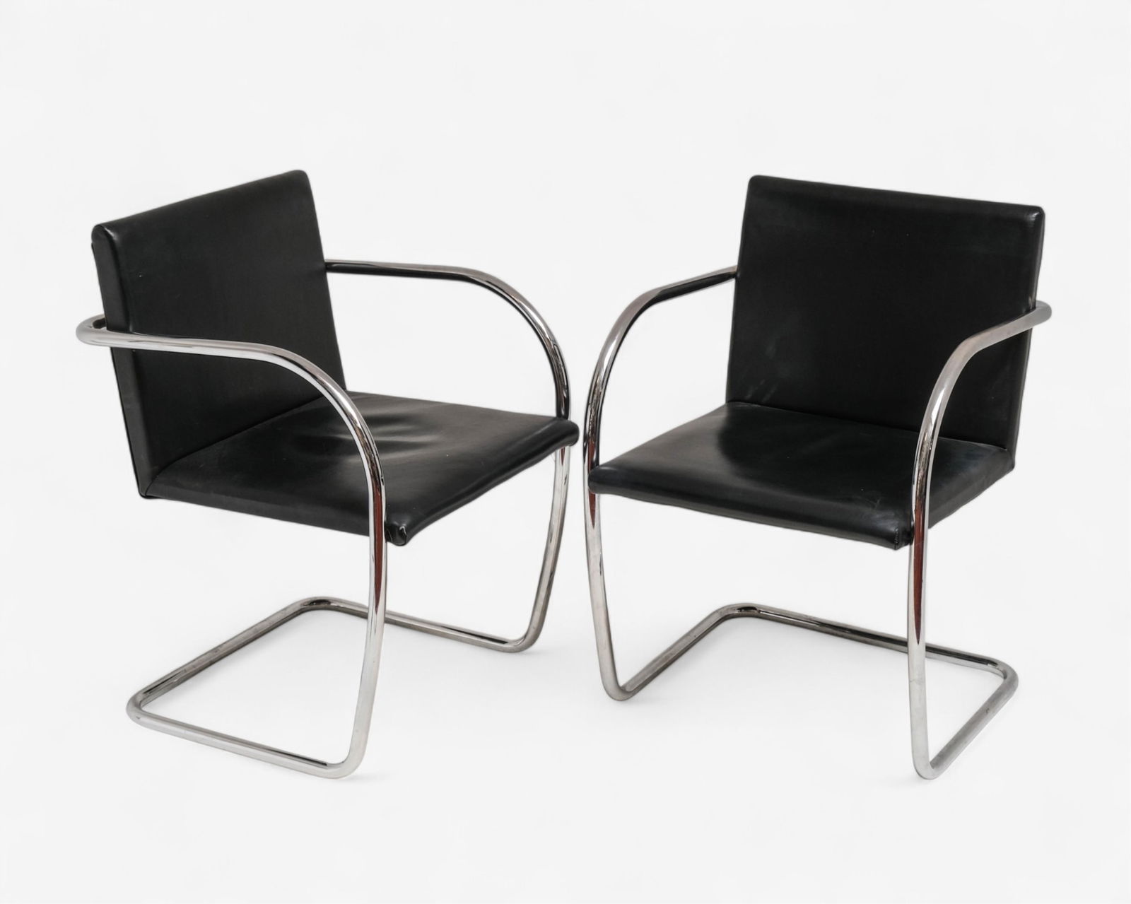 Mies van der Rohe Pair of Brno-style Armchairs After 1928 Design: Keywords: No reserve, modernist furniture, cantilever chairs, faux leather, mid-century style, minimalist seating, 1920s design, contemporary production, architectural furnitureSummary:Mies van der Ro