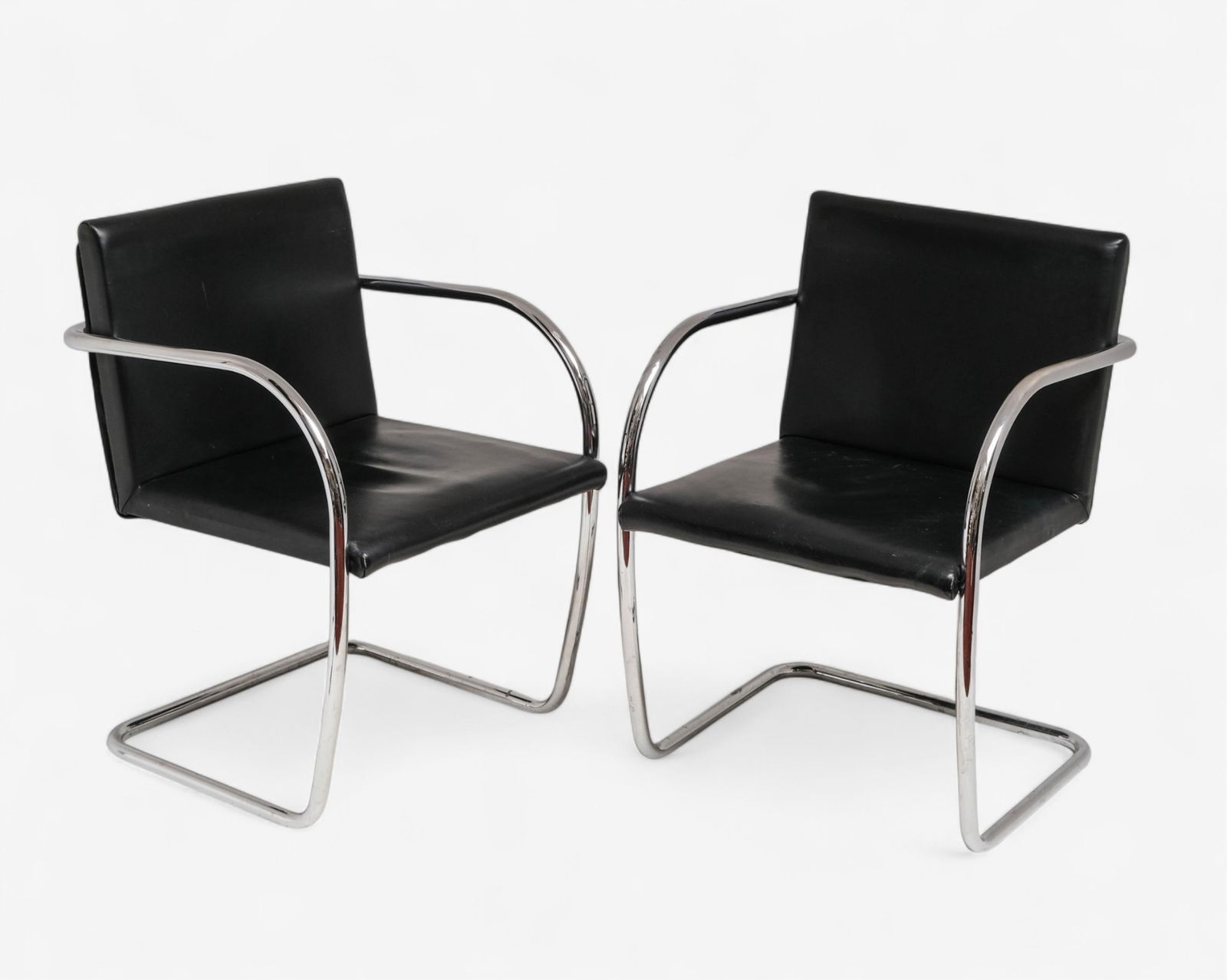 Pair of Brno-Style Armchairs After Mies van der Rohe: Keywords: No reserve, modernist furniture, cantilever chairs, faux leather, mid-century style, minimalist seating, 1920s design, contemporary production, architectural furnitureSummary:Pair of Brno-st