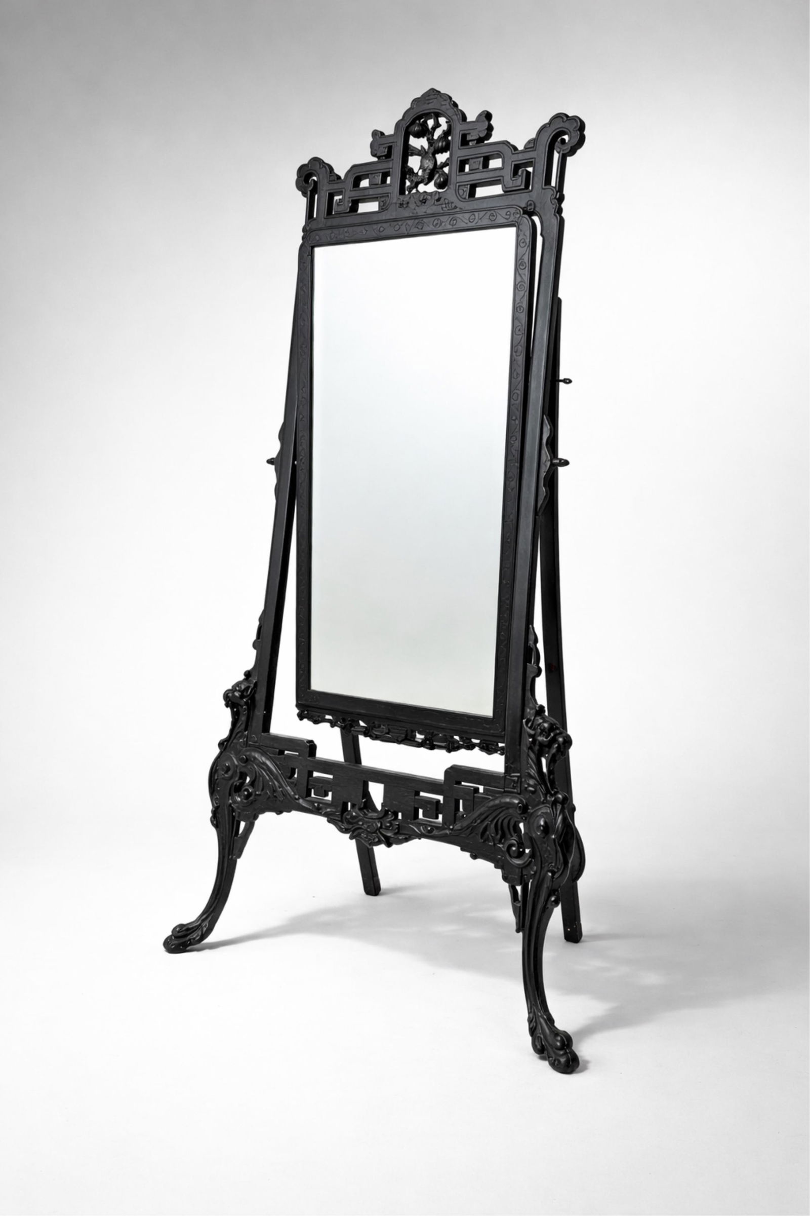 Ebonized Japonism Cheval 70" Mirror with Carved Ornamentation 19th Century: Keywords: Japonism, full length dressing mirror, ebonized wood, orientalism, griffin feet, Viardot, adjustable mirror, 19th-century Eastlake furniture, ornate carving, luxury home decor, vintage mirro