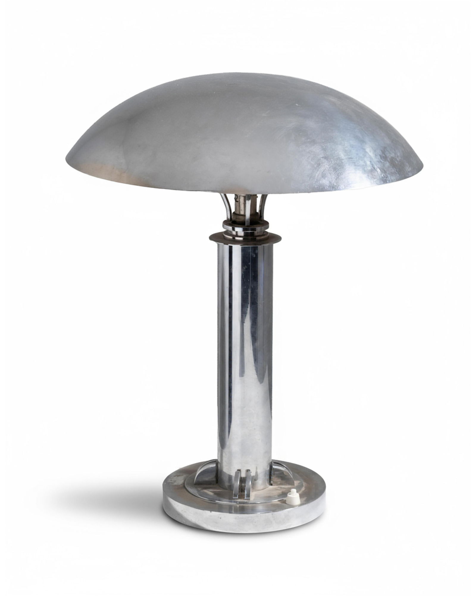 Bauhaus or Art Deco table lamp, designed by Miloslav Prokop, c. 1930: Keywords: machine-age, dome shade, column stem, circular base, chrome-plated metal, Bauhaus influence, streamline moderne, desk light, modernist lighting Summary: Bauhaus or Art Deco table lamp,