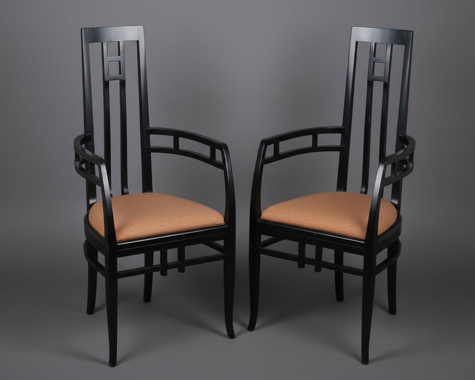 Giorgetti Pair of Black Lacquered Armchairs, Italian Modernist with Vienna Secession Influence: Keywords: Arts and Crafts, Italian Modernist, Jugendstil, Early 20th Century Design, Mackintosh style, Josef Hoffmann style, , ebonized wood, upholstered seat, 1900s era, geometric backrest constructi