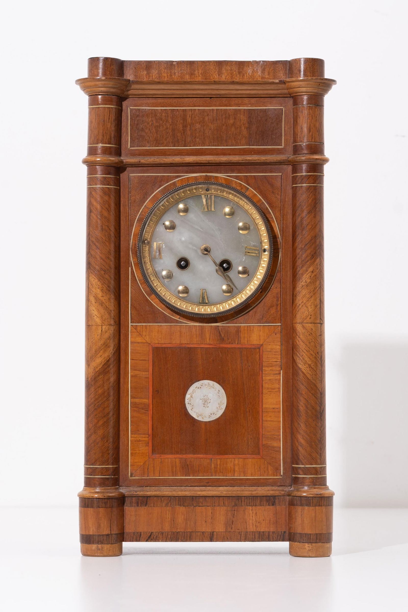 Vienna Secession Pendulum Chiming Clock, with Walnut and Mahogany Veneer, 19th Century: Keywords: Vienna Secession, Neoclassical Revival, horology, walnut, mahogany veneer, early 19th century, inlaid marquetry, pillar case design, classical dial numerals Summary: Vienna Secession