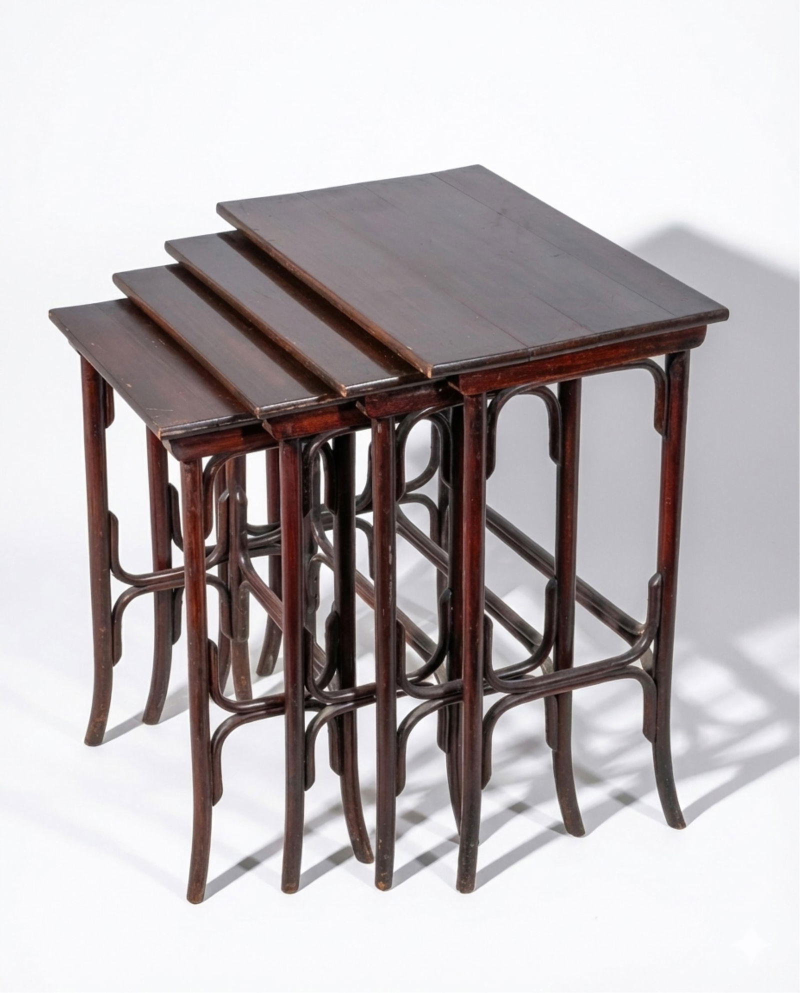 Vienna Secession 4 Bentwood Nesting Tables, circa 1900: Keywords: Art Nouveau, Ebonized, Vienna Secession, Thonet Era, Early 20th Century Design, European Modernism, Bentwood Furniture Movement, Michael Thonet style, Josef Hoffmann style, Otto Wagner