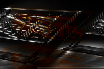 Arman (Armand Pierre Fernandez) Signed encased trumpet parts, wIth display mounting..