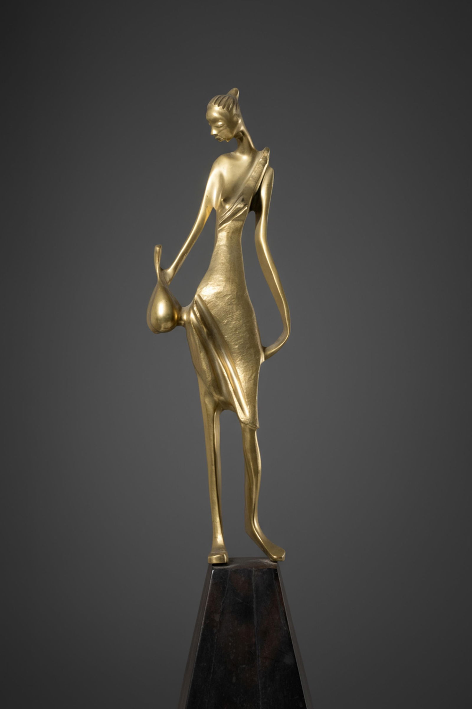 French Mid-Century Bronze Figure of African Woman on Marble Base, c. 1950: Keywords: Art Deco, Karl Hagenauer style, Modernist style, elongated form, gold-toned patina, figurative sculpture, Africanist subject, female figure, Continental decorative arts, 20th-century sculptu