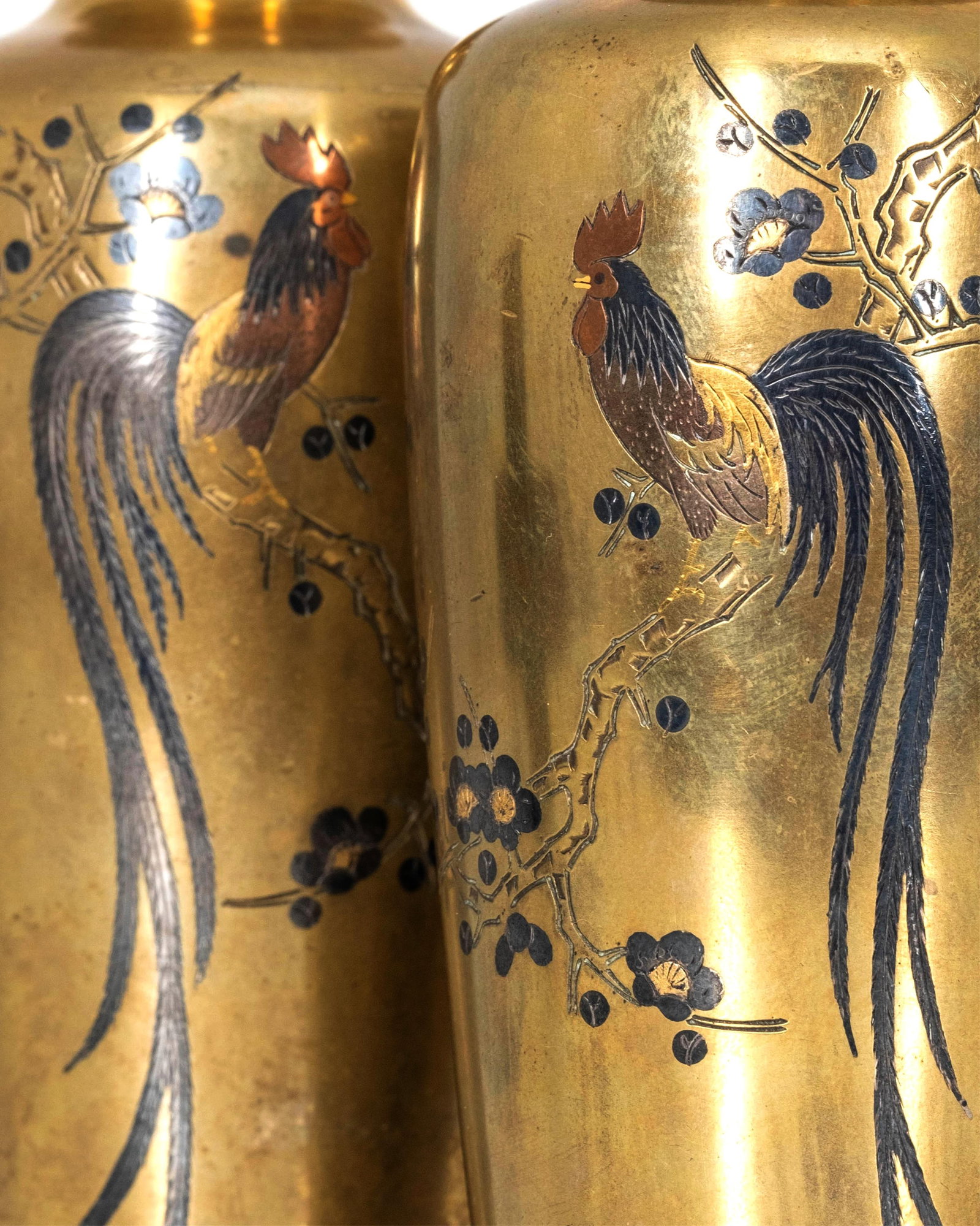 Japanese Meiji Period Bronze Rooster And Plum Vases, Pair: Keywords: No RESERVE, mixed metal inlay, gilt brass, miniature vase, small urn form, rooster motif, bird decor, plum blossom branch, Japanese metalwork, signed mark, table display, cabinet object, Asi