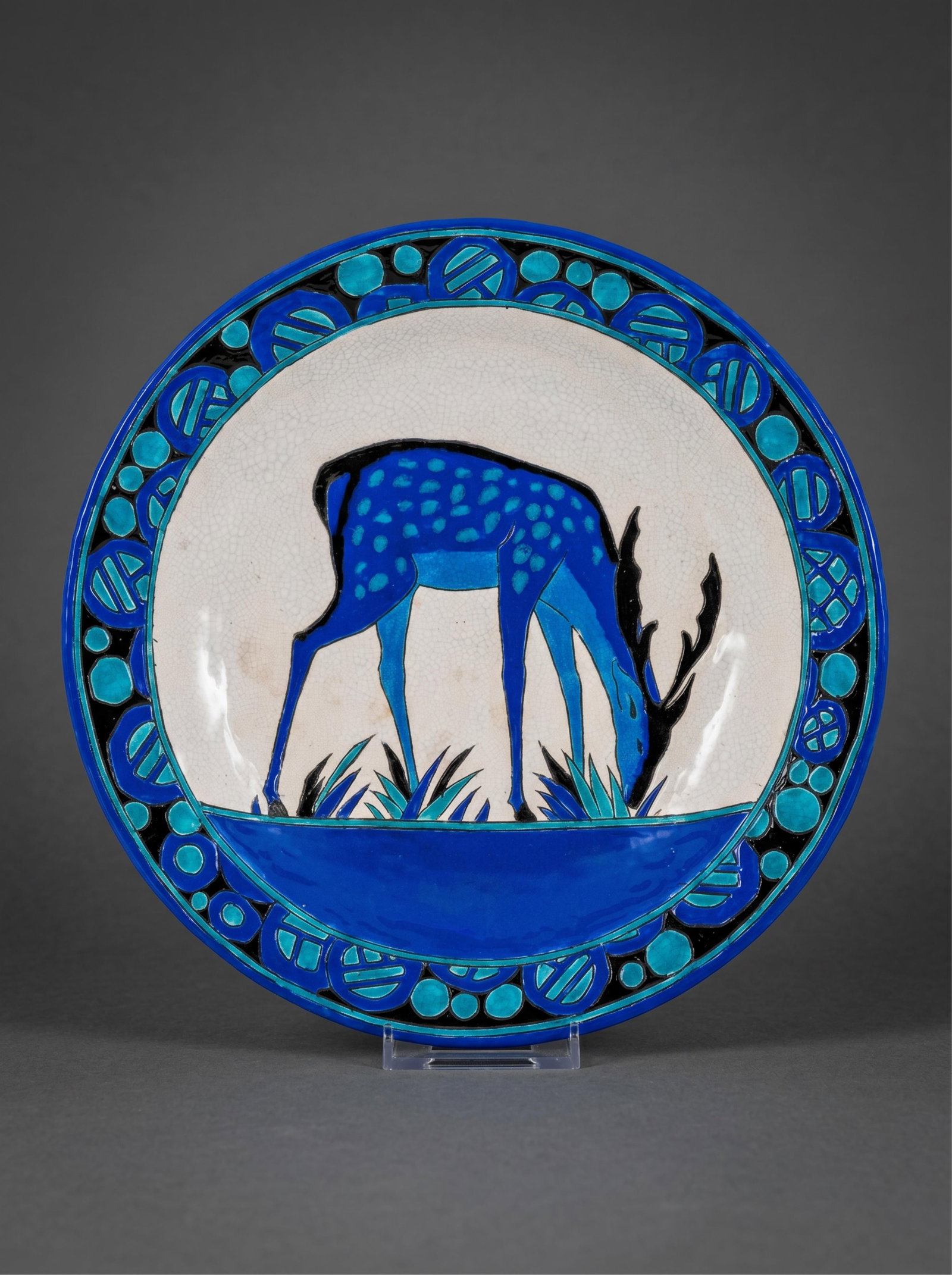 Charles Catteau Signed Art Deco Nouveau Iconic Charger with the Deer Motif, Boch Freres and Artist: Keywords: Charles Catteau, Boch Freres, Keramis, Belgian Art Deco, charger plate, deer motif, ceramic charger, faience, Belgian pottery, geometric border, cobalt glaze, turquoise enamel, Catteau charg