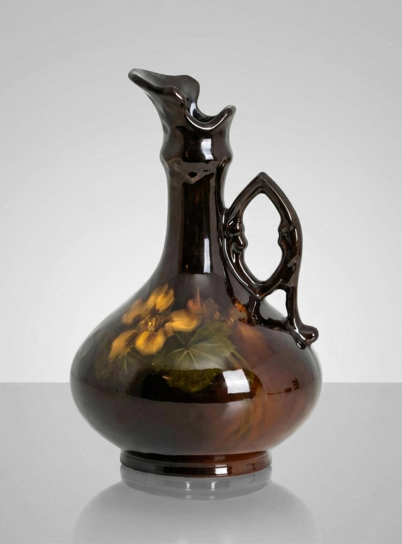 American Arts and Craft Rozane Ware Art Pottery Ewer, C. 1900: Keywords: Arts and Crafts, American pottery, Early 20th century, Hand thrown ceramic, Matte glaze, High gloss finish, floral motif, stylized blossoms, brown glaze, chocolate tone, bulbous form, ewer f