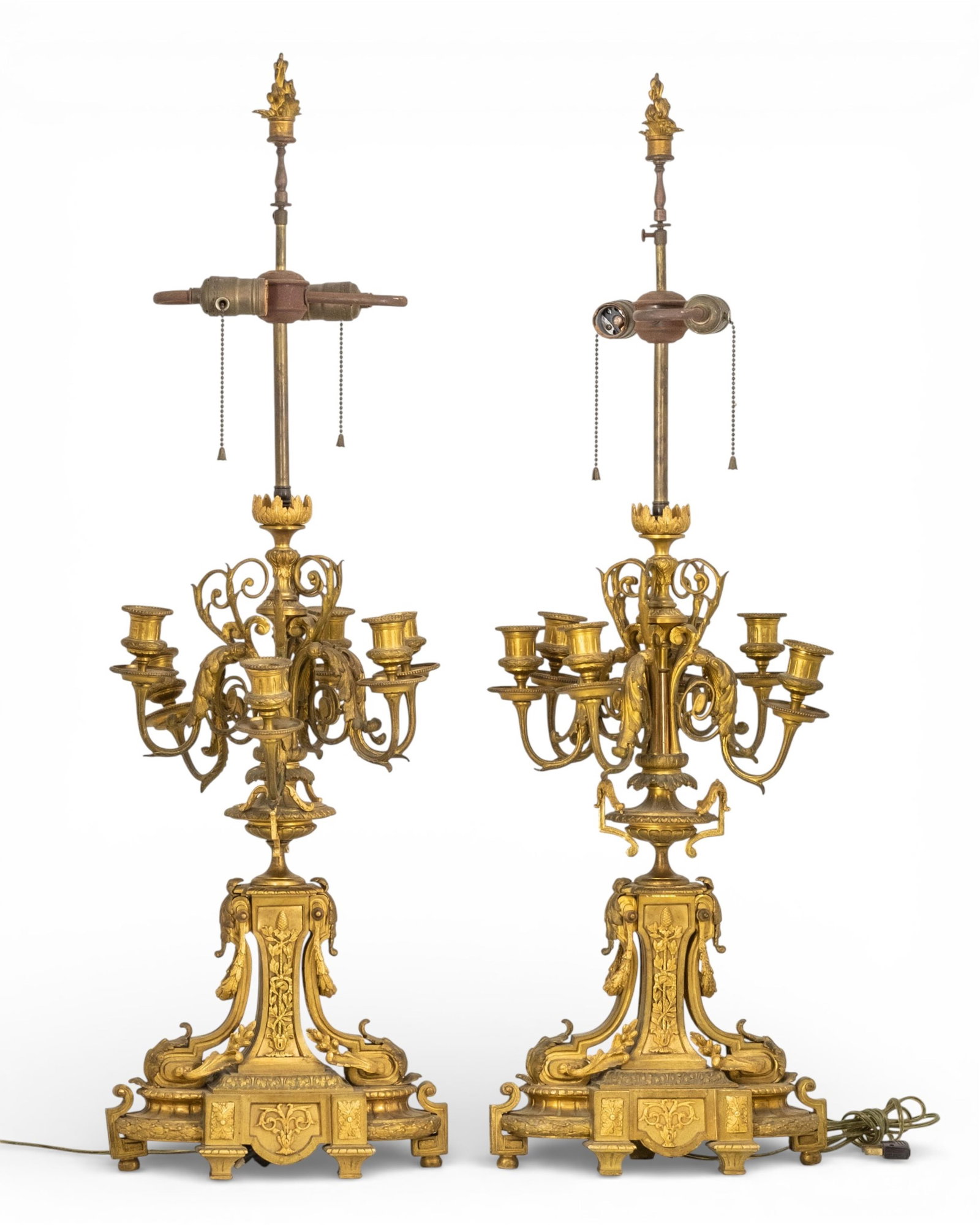 Pair of Monumental French Gilt Bronze Five-Light Candelabra Converted to Table Lamps, 19th Century: Keywords: ormolu bronze, fire-gilt surface, neoclassical influence, louis revival style, scrolling foliate arms, acanthus leaf ornament, cast bronze construction, hand-chased details, architectural li