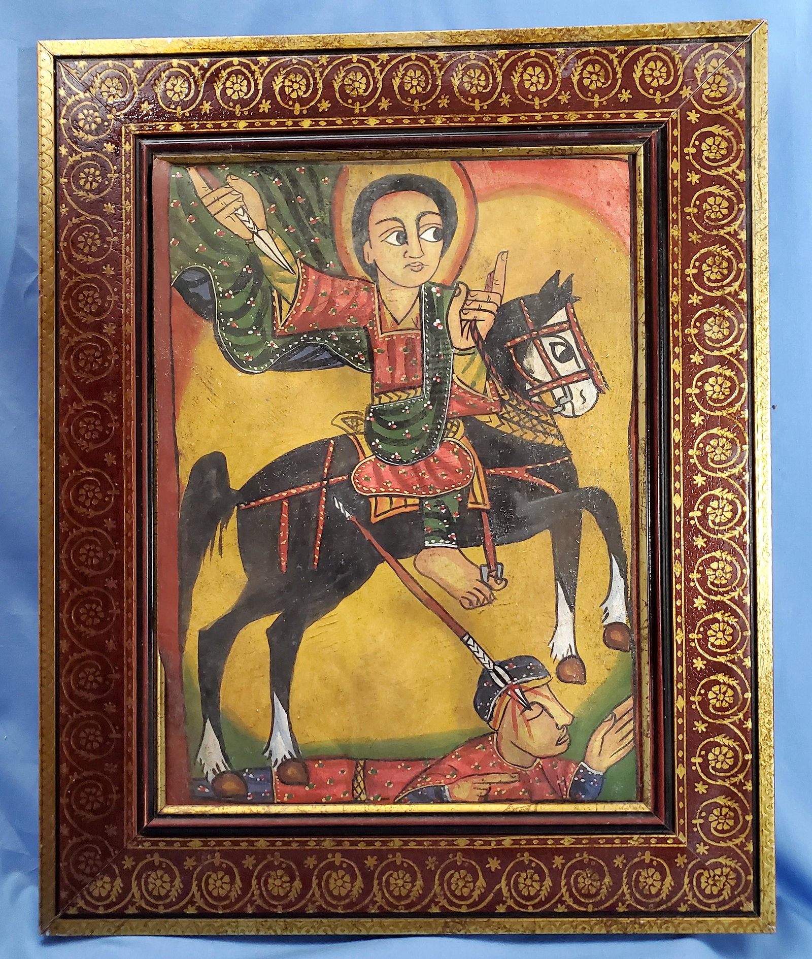 Antique Ethiopian Icon/painting, Exceptional Quality: Rescued from a crumbling Ethiopian church building by an American worker in the mid 1960s and framed in a very decorative quality frame it will brighten any living room or space. Size: 22" x 17 1/2" f