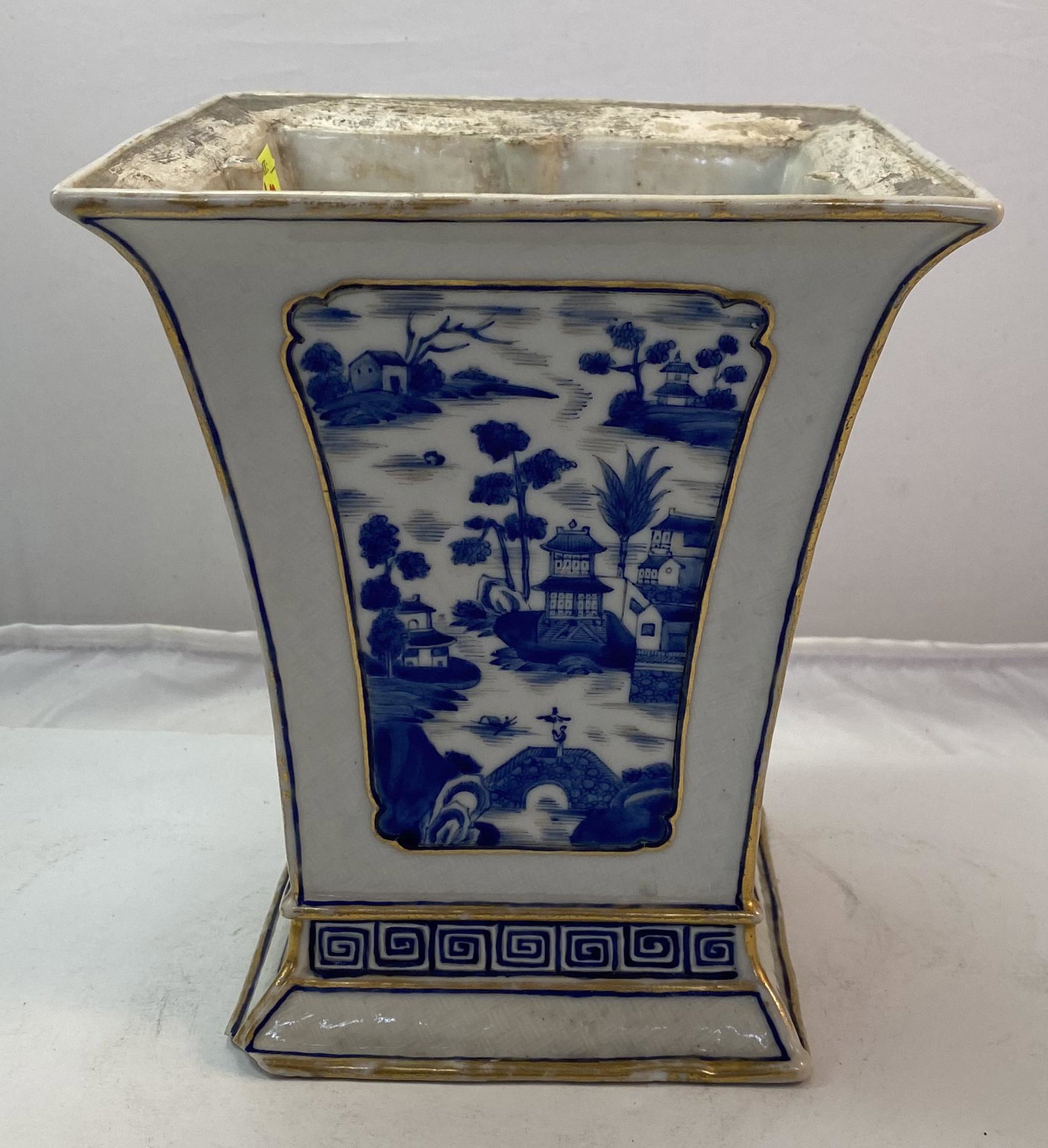 Early 19th c. Porcelain Vase: Early 19 th century porcelain vase, square form, each side decorated with a lake view landscape and a running meander all around and gilding to accentuate the borders 7 ½ in. high and 7 3/8 x 6