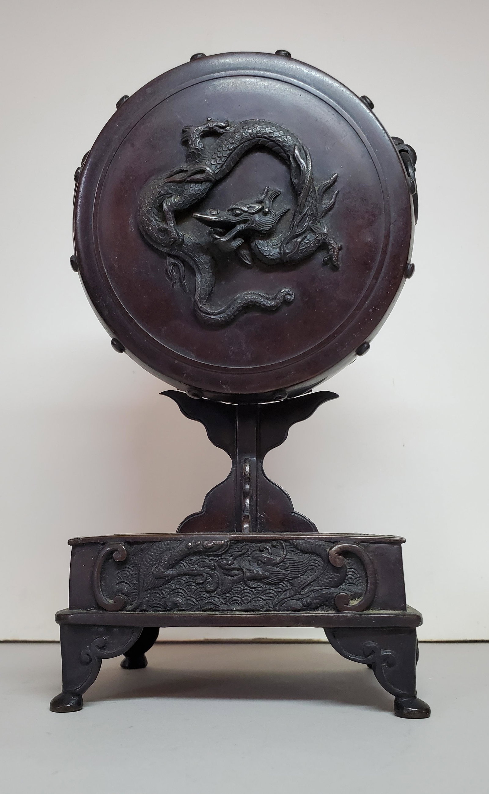 Japanese Bronze Drum Form Box: Japanese bronze box in the form of a drum on a fancy rectangular stand, 8 ¾ in. high x 4 ¾ in. wide x 3 ¼ in. deep