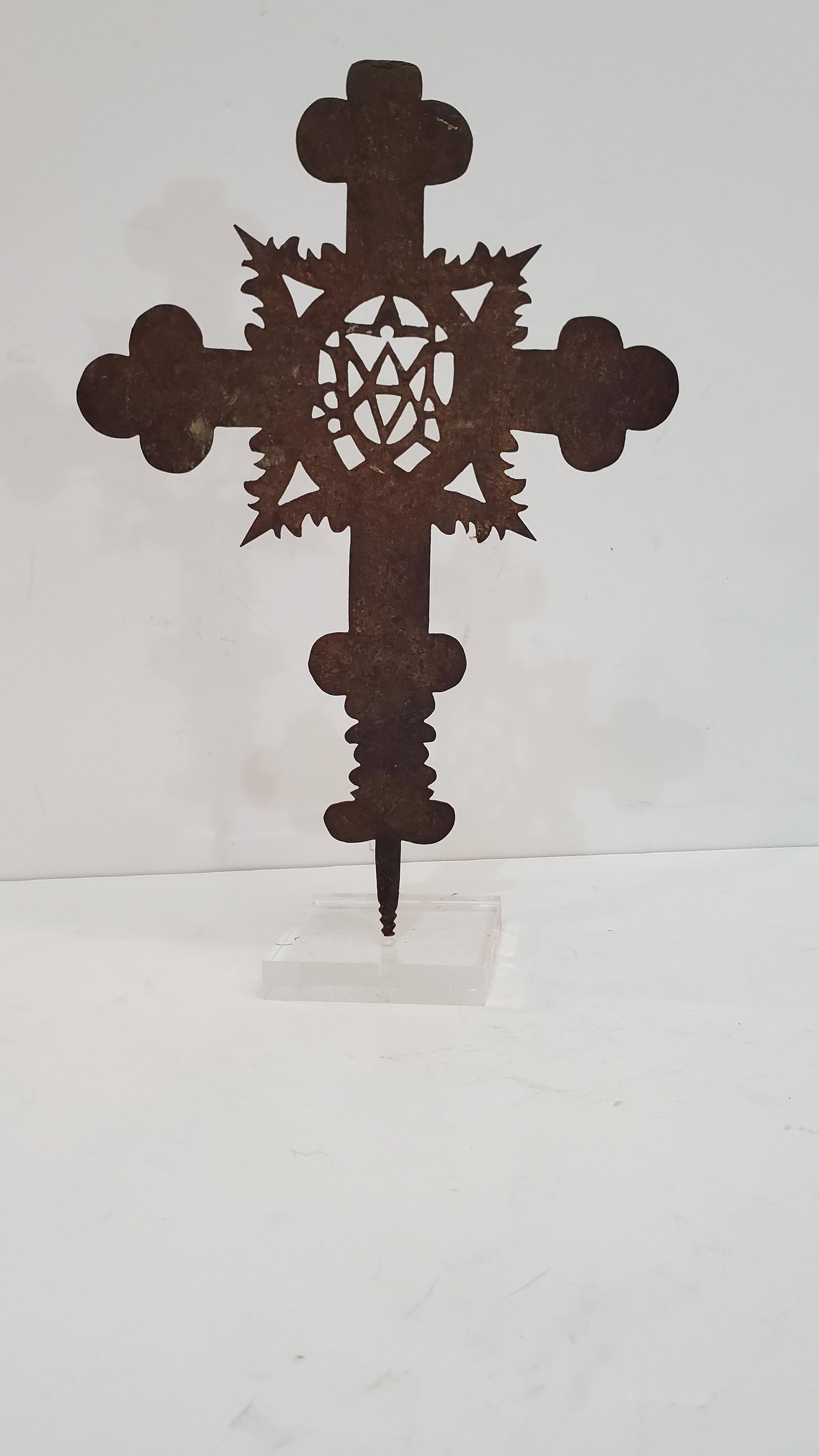 Iron Byzantine Cross: Byzantine Wrought Iron Cross. Extremely rare example with cut-out design at the center containing an anagram, several Latin and Greek letters which can be read to give either a sacred dictum or name. 
