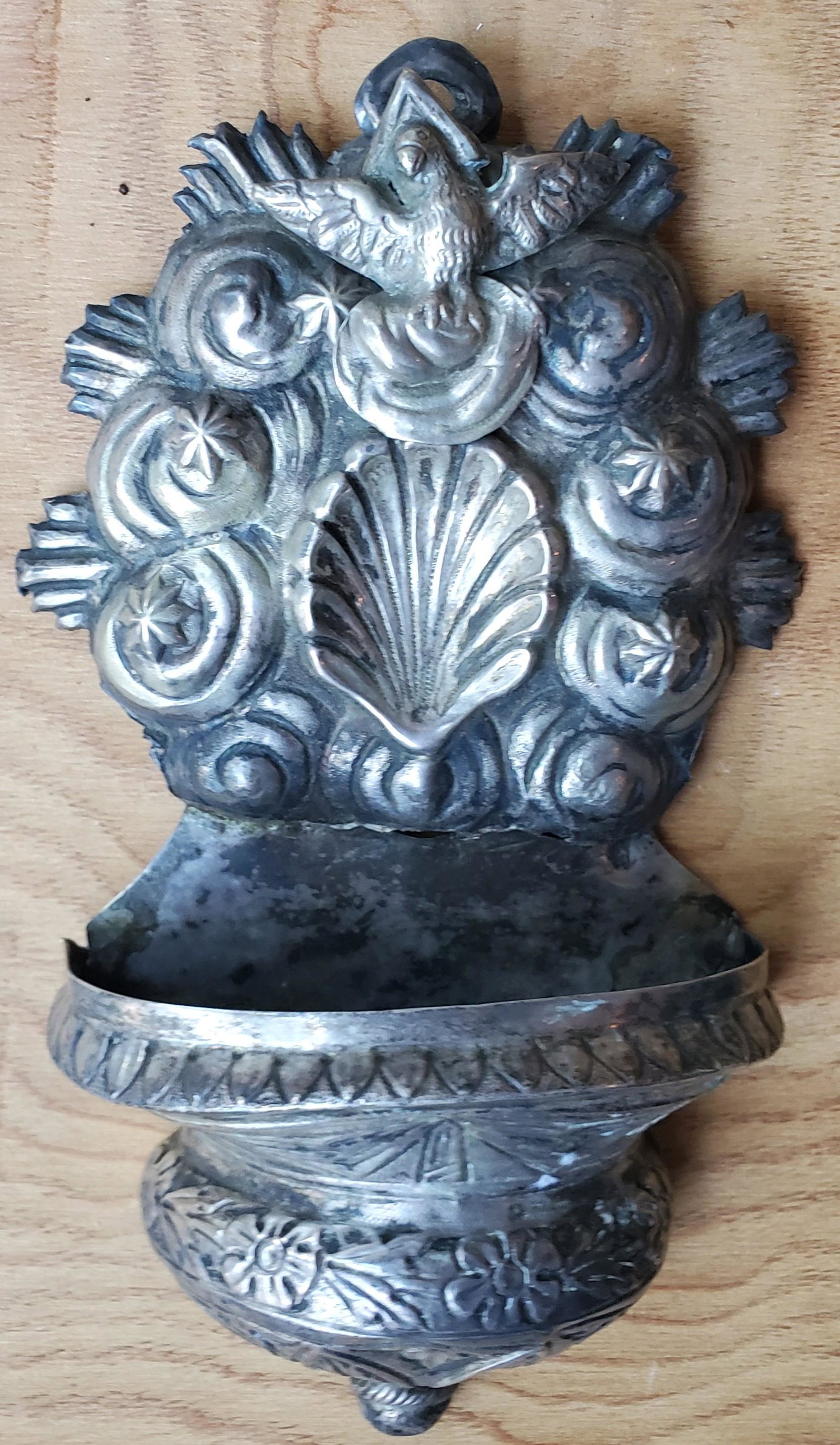 Italian Silver Font: Italian Silver. Antique Silver water font with stars amongst clouds and the Holy Spirit, 1800â€™s. 7 7/8 in. high x 4 ½ in. wide x 2 in. deep