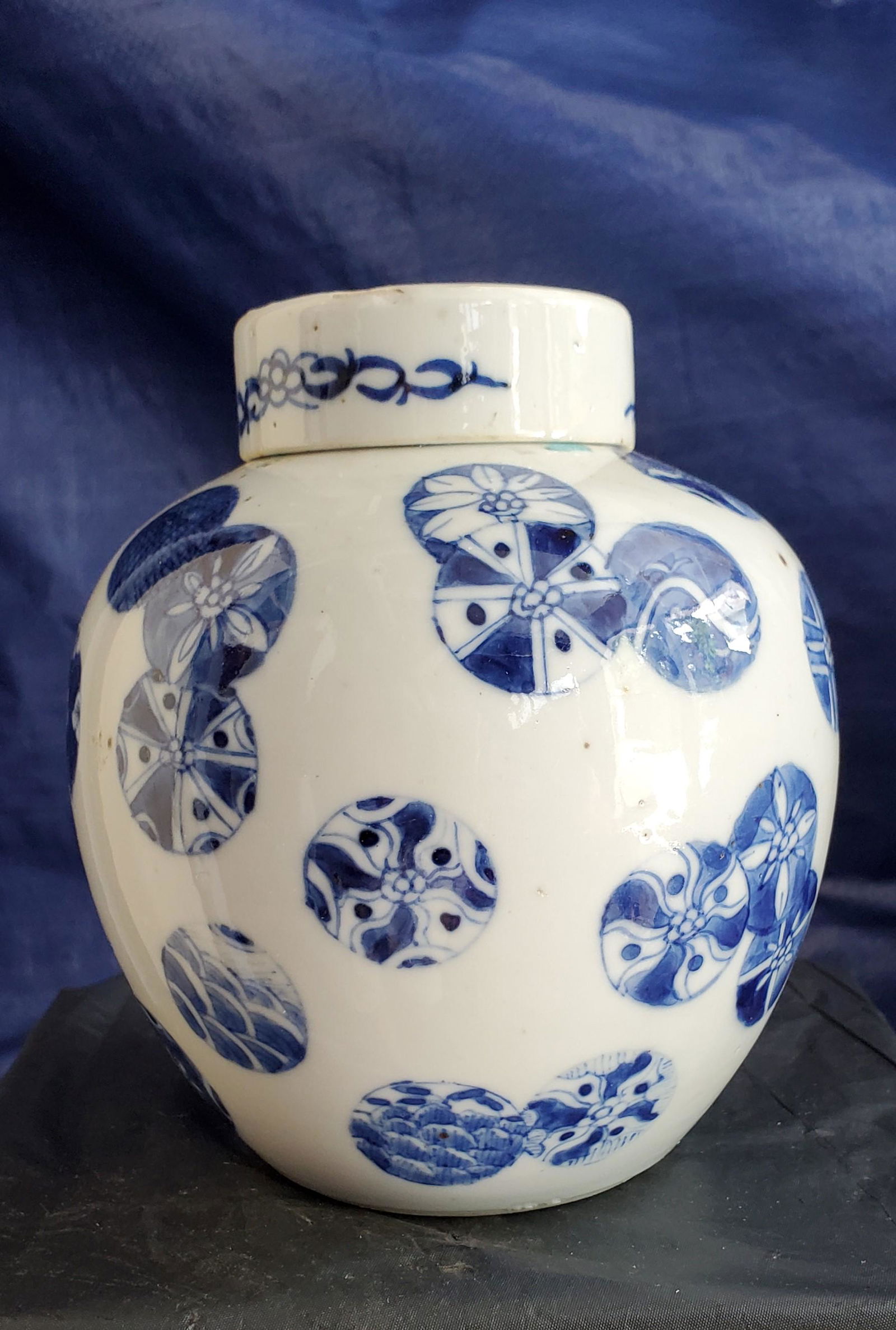 Chinese Lidded Bowl: A Chinese porcelain lid-covered jar, 19 th Century, with signature at the bottom 5 ¾ in. high x 4 ¾ in. diameter.