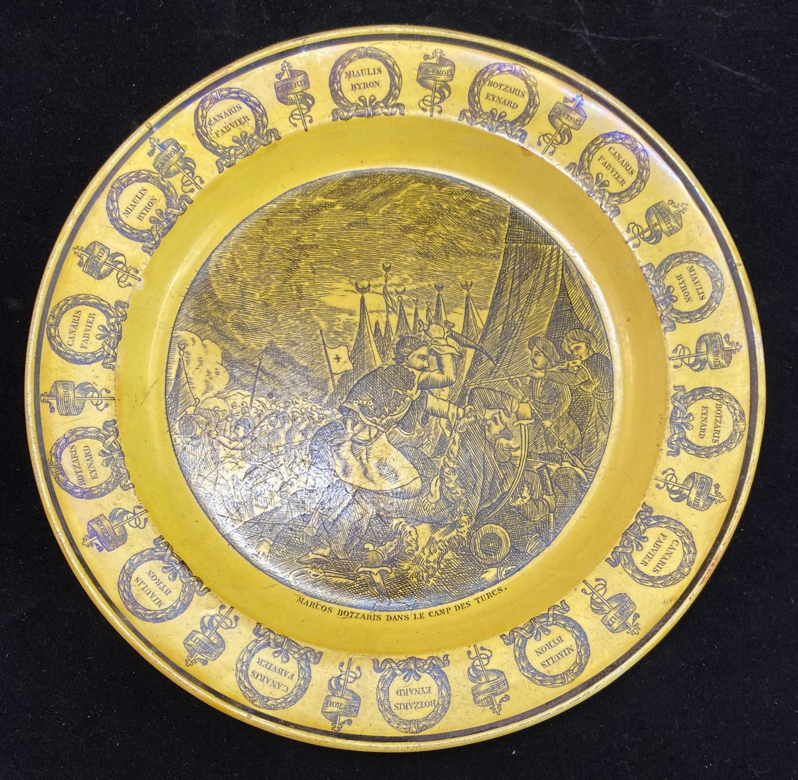 Plate with Scene of Greek Revolution: Greek Revolution interest: A Creil type, early 1820â€™s French yellow plate with illustration of a battle between Greeks and Turks with Marcos Botsaris fighting the Turks. 8 ½ dia. x 7/8.