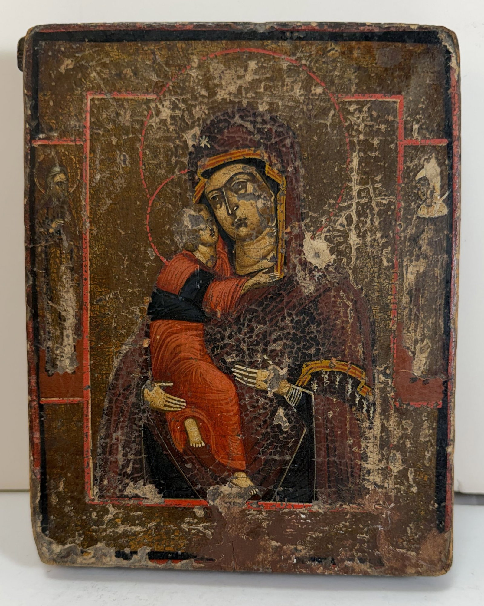 Small Russian Icon of the Virgin and Child, early 19th Century: Egg tempera on wood panel. 7 by 5 1/2 inches, Depth: 1 inch. Weight: 10 oz. This item is at our New York location.