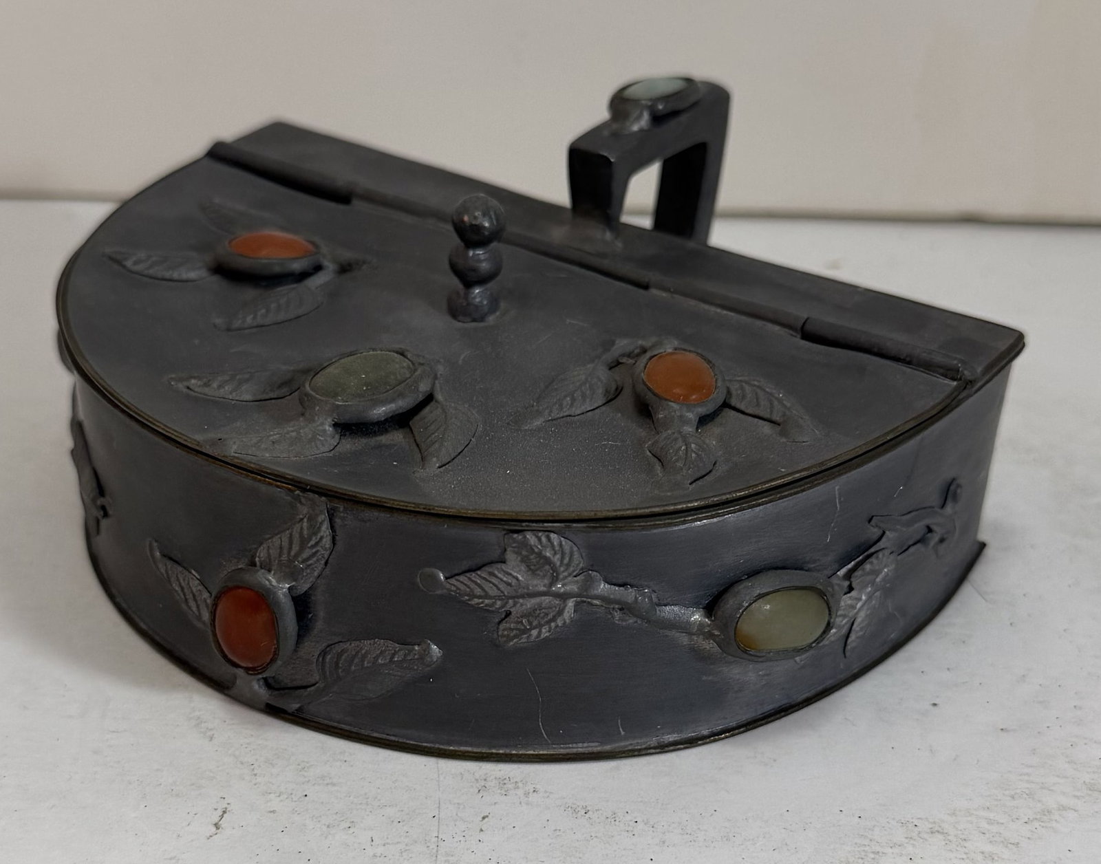 Chinese Hardstone Inlaid Pewter, ca. 1900: Probably a tailors iron. Width: 5 1/4 inches, Depth: 4 1/2 inches, Height: 2 inches. Weight: 14.7 oz.