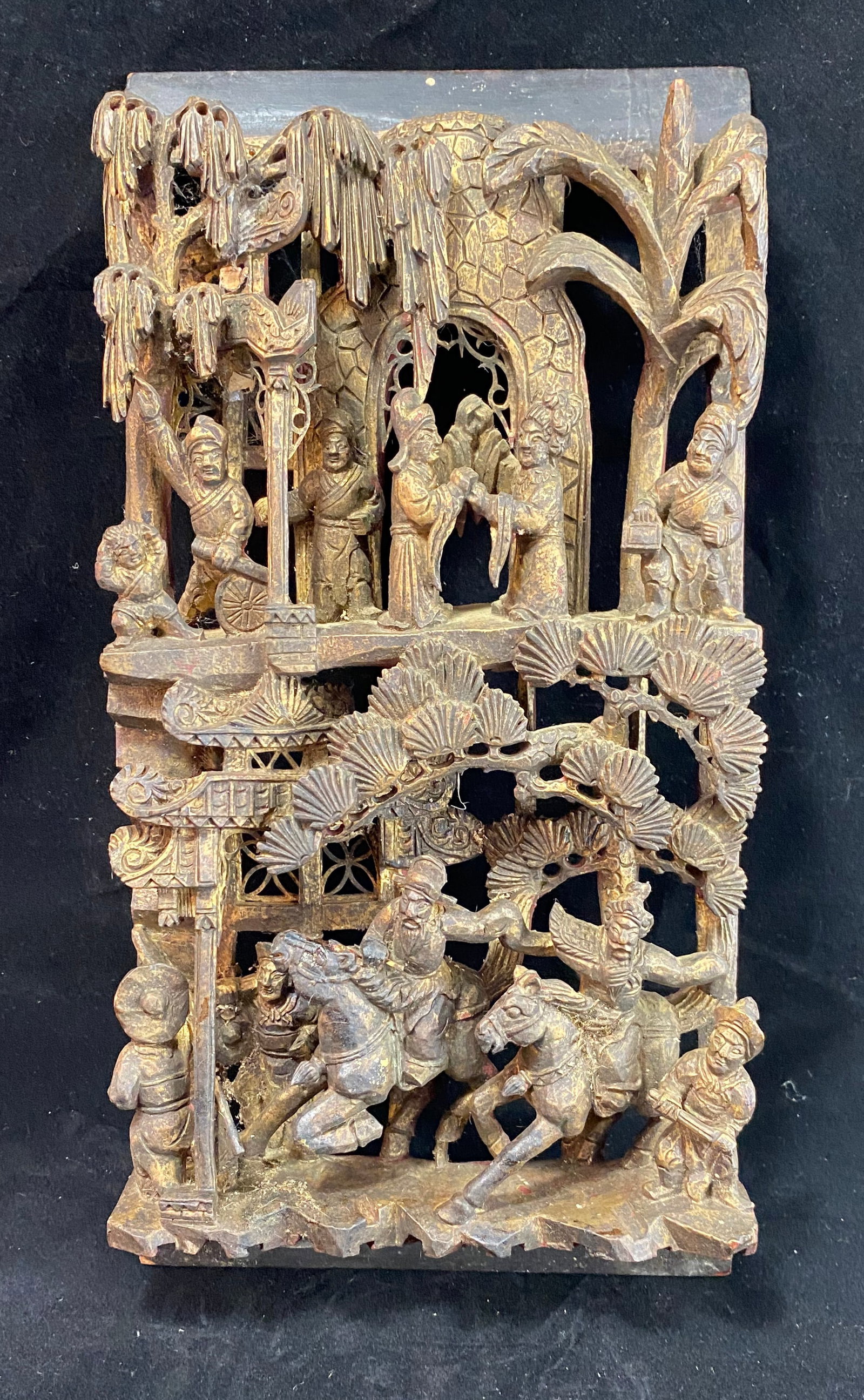 Chinese Carved Wood Decorative Panel: With figures in various pursuits, likely was originally part of a door, or a piece of furniture. 13 3/4 by 6 7/8 inches, Depth: 2 inches. Weight: 1 lb. 1 oz.