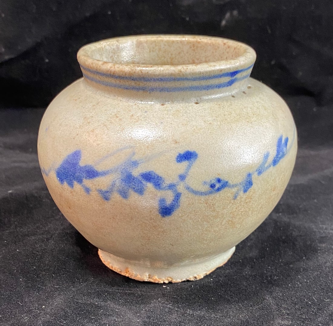 Korean Blue and White Pottery Vessel, 18th Century or earlier: Height: 3 1/2 inches, Diameter: 4 1/4 inches. Weight: 15 oz. This item is at our New York location.