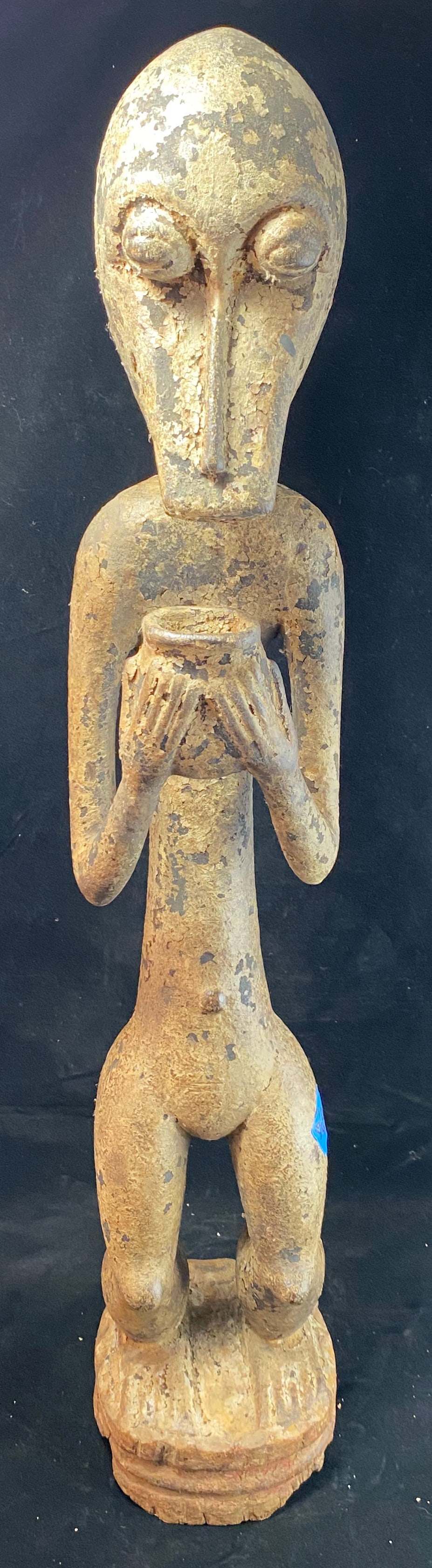 African Carved Wood Figure of a Monkey: Height: 27 inches, Width: 5 inches, Depth: 6 inches. Weight: 6 lbs. 10 oz.