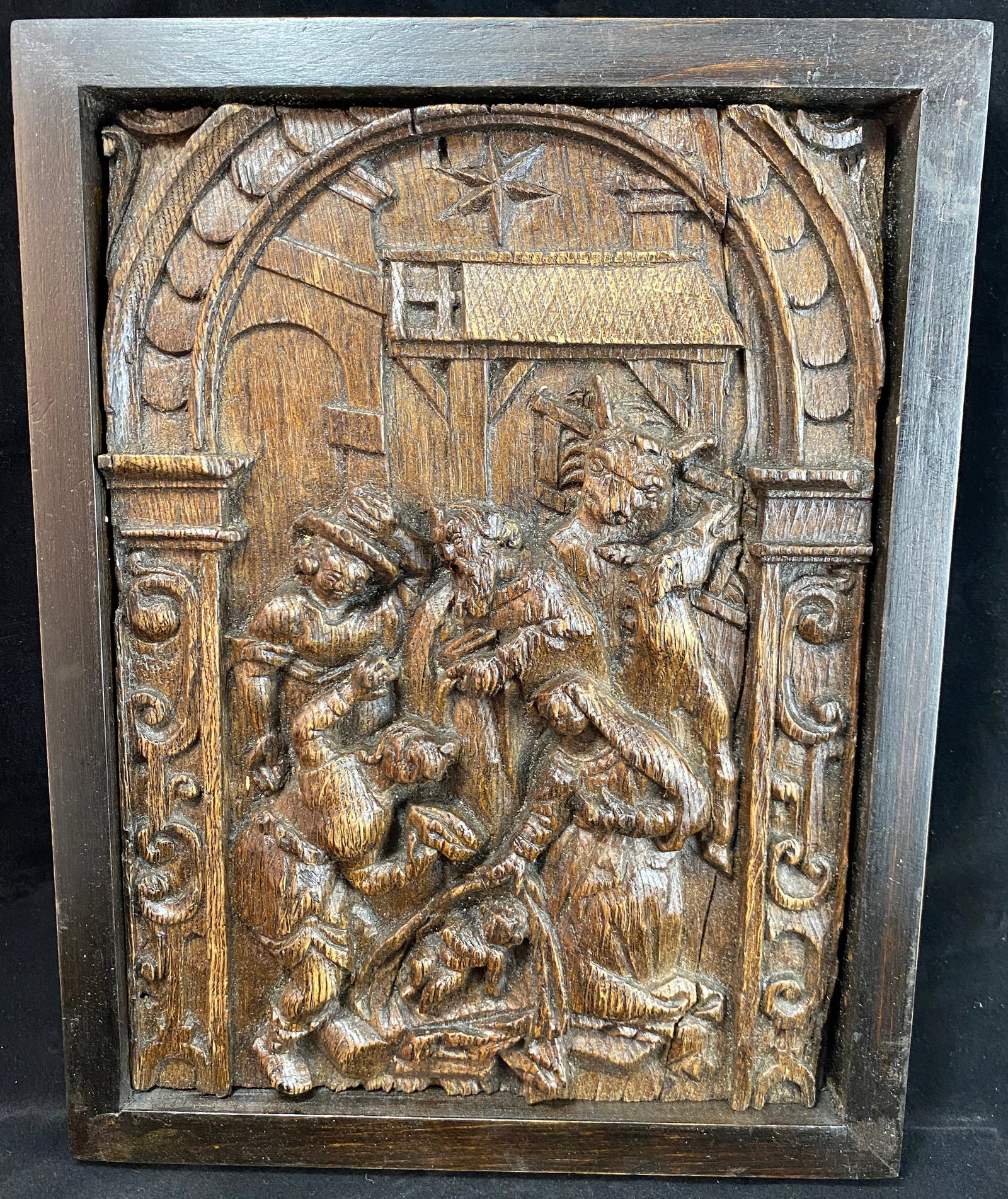 Flemish Carved Oak Panel with the Nativity: Depicts Mary and Joseph in a stable, surrounding the baby Jesus. Probably once part of a larger piece of furniture and cut down in the 19th or early 20th Century. The panel 12 3/4 by 9 1/4 inches,