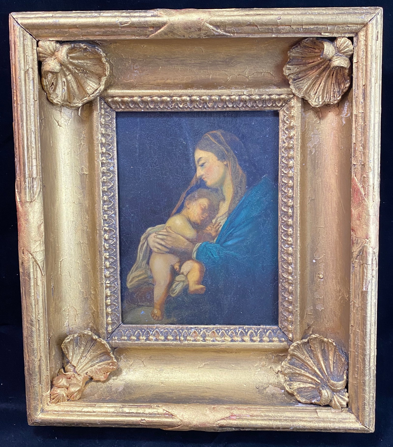Painting on Marble, Renaissance (or Style?) Painting, Polychrome on Marble, 19th C or earlier: A mother and child, possibly a Madonna and child, an intimate moment with the mother in blue holding a sleeping baby, possible repair through the center. The panel 7 3/4 by 5 3/4 inches, the frame 13