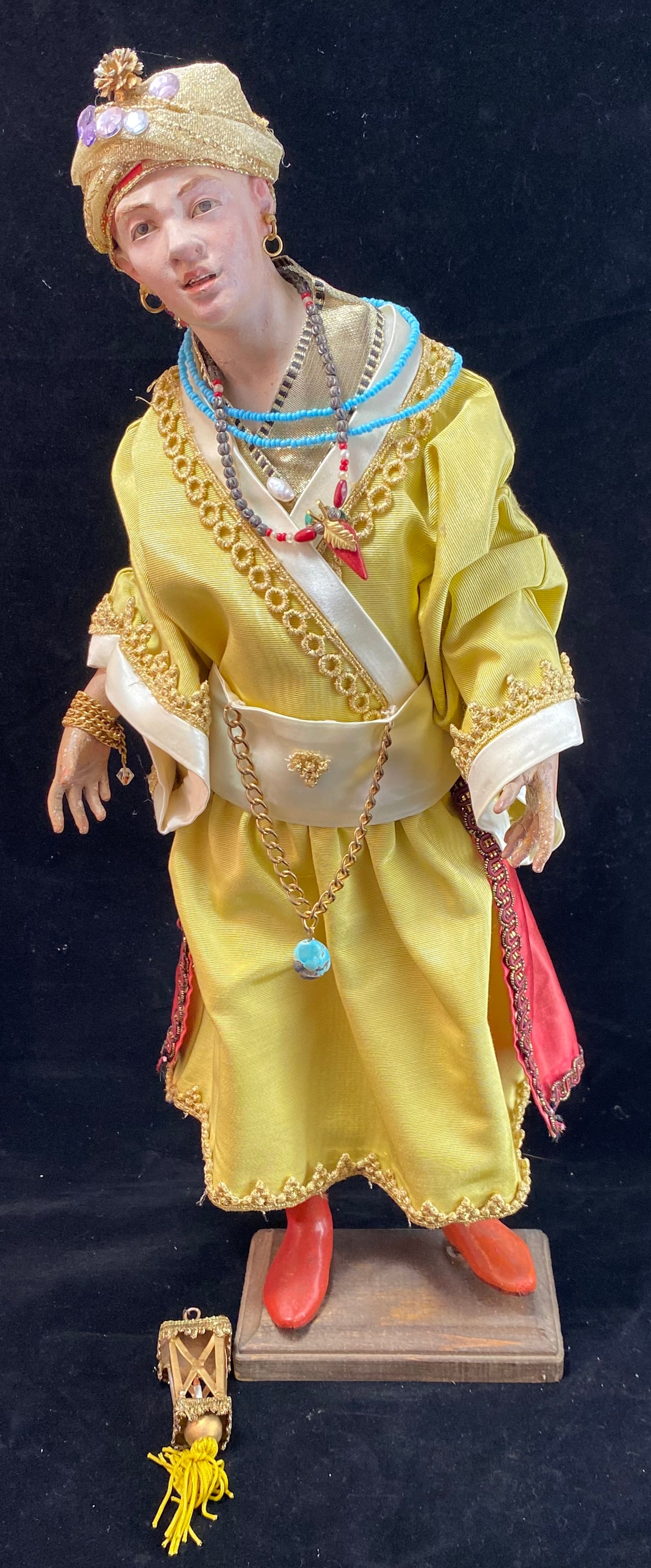 Neapolitan Creche Figure of Balthazar: With beautifully detailed clothing, the face with inset glass eyes. Provenance: The Estate of Oscar Magnon. Height: 18 3/4 inches, Width: 7 inches, Depth: 4 1/2 inches. Weight: 1 1/2 lbs. This item