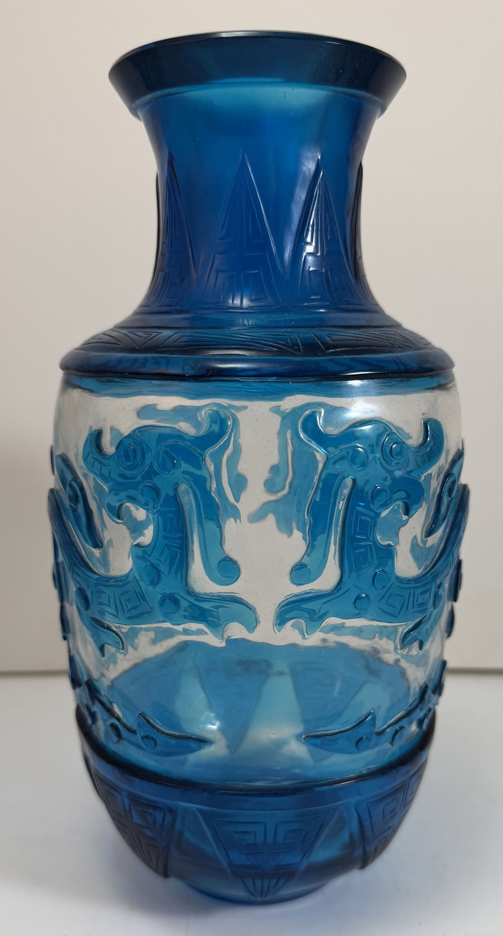 Chinese Peking Blue Over Clear Glass Baluster Vase: Minor wear from age and use. Height: 9 inches, Diameter: 4 1/2 inches. Weight: 2 lbs. 11 oz. This item is at our New York location.