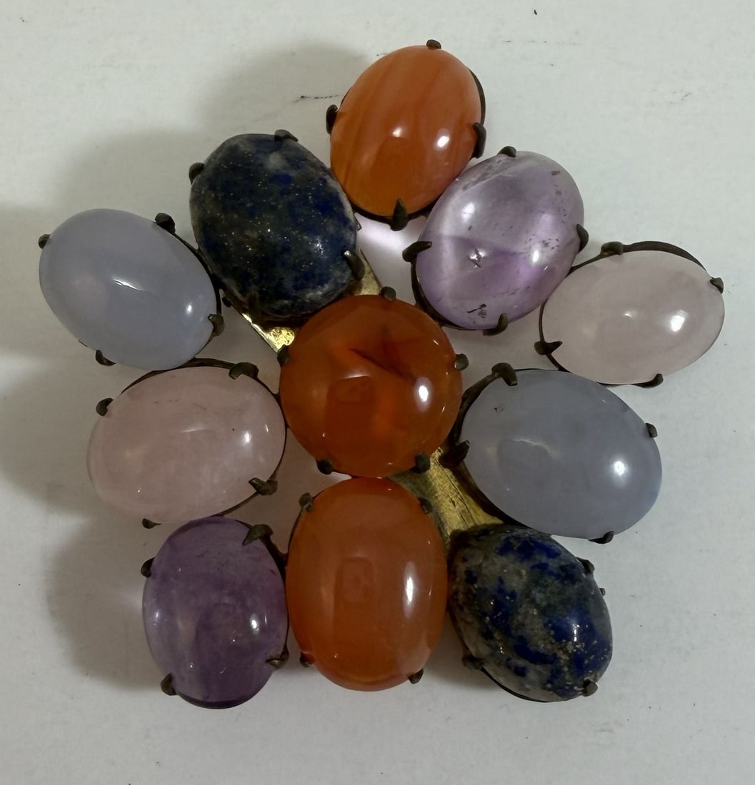 Chinese Antique Semi-Precious Hardstone Inset Clip or Ornament: With an indistinct mark on the back, possibly ‘China’, gold plate mount. 2 1/4 inches by 2 1/4 inches. Weight: 1.2 oz. This item is at our New York location.