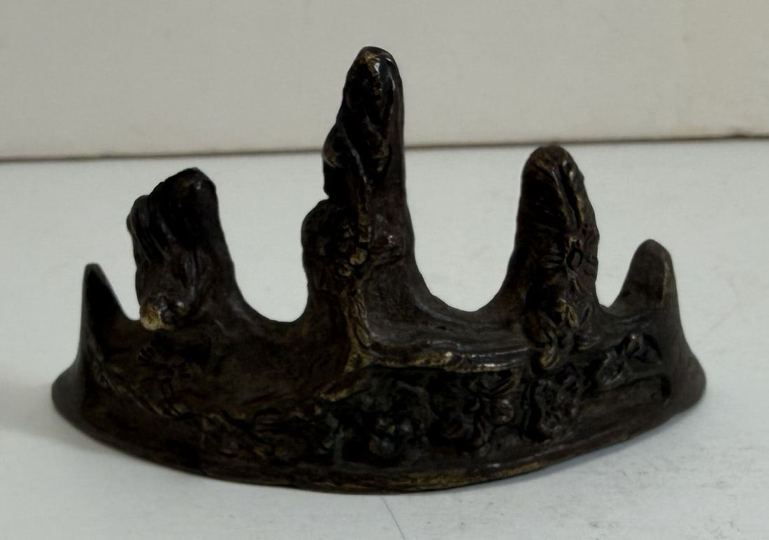 Chinese Bronze Deer and Flower Brush Rest: The brush rest in a mountain form, and decorated in relief with a deer and plum blossoms. Width: 3 3/8 inches, Height: 1 3/4 inches, Depth: approx. 1 1/4 inches. Weight: 3 oz.