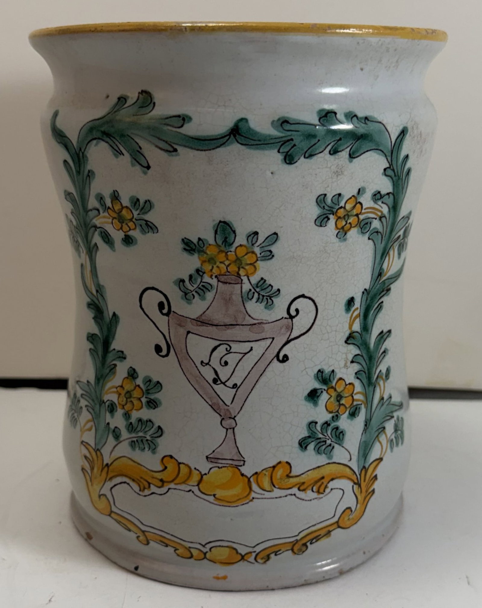 Italian Majolica Tin Glazed Albarello, dated 1792: The back dated 1792, and probably of the period, the front decorated with scrolling foliage and a vase. Height: 7 1/4 inches, diameter: 6 inches. Weight: 2 lbs. 9 oz. This item is at our New York