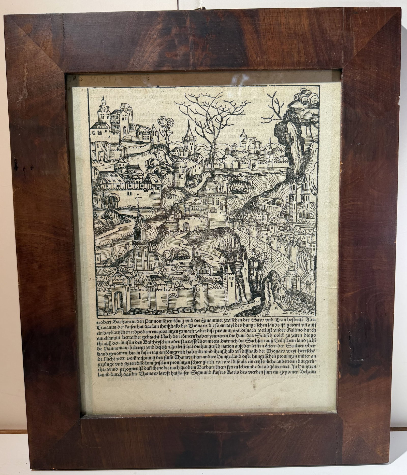 Incunable, H. Schedel, Westvalia Hassia, a Leaf from the Nuremberg Chronicles, Etching, 1493: An incunabulum, The Nuremberg Chronicle, by Hartmann Schedel was a history of the world up to 1493. Framed, an original page from the manuscript, printed with a landscape of a town, Westfallia and Hes